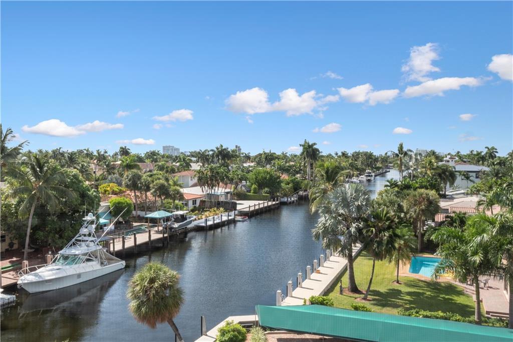 Beautiful water views from this fantastic all new 2/2 with a flair of Mid-Century Modern. This really is something special with water views from every single room and a screened in balcony.  The brand new kitchen has quartz counters, new Commercial AC, floor to ceiling impact windows and doors, tankless water heater, washer & dryer and new luxury vinyl plank floors throughout. The guest bathroom is stunning and adorable....and there's so much more including smooth ceilings, tankless water heater, new interior doors & LED lighting throughout.  Small pet friendly with one dog or cat allowed under 20lbs and leasing after one year.  This boutique Mid-Century Modern building is right on East Las Olas Blvd and only 5 minutes to the Beach...what a location!