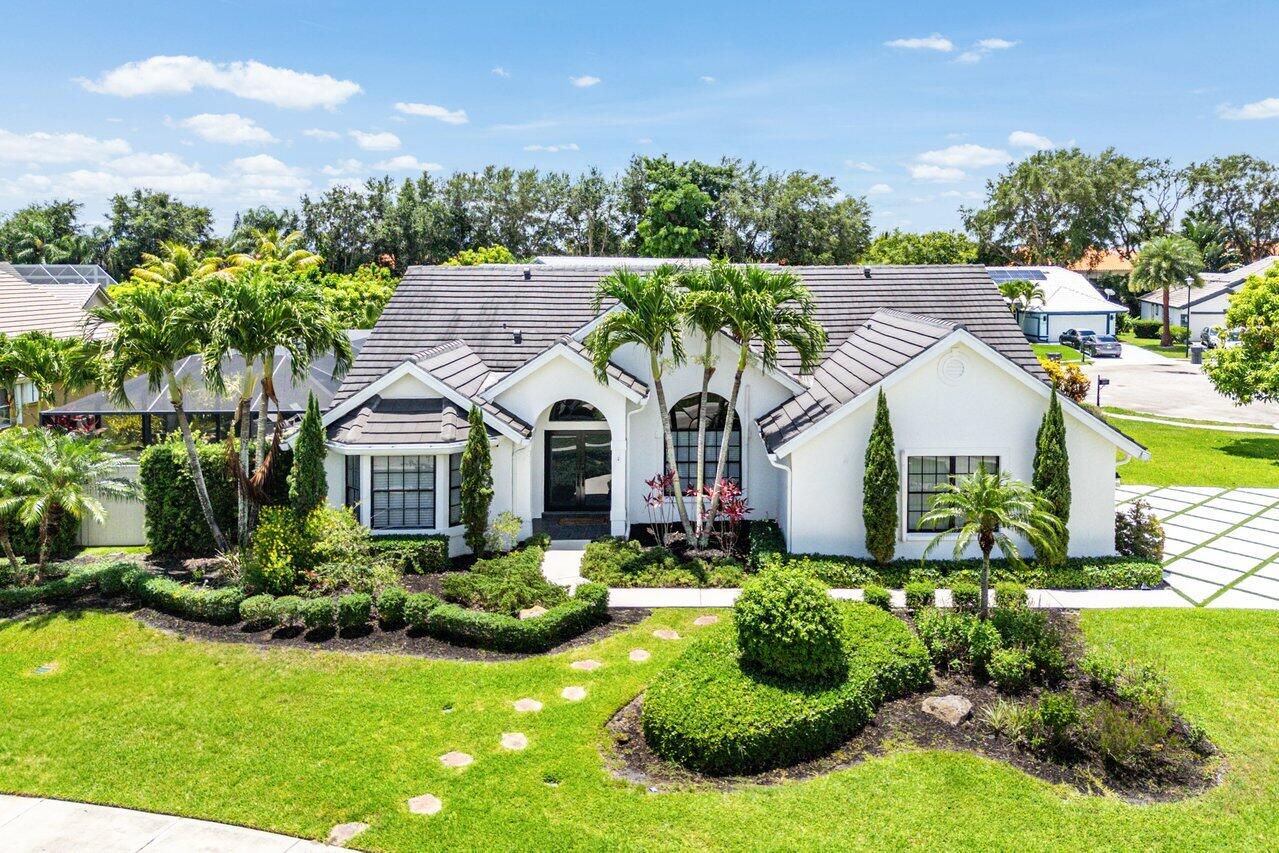 Spend your summer surrounded by luxury, sunshine, and the elegance of South Flo living in Stonegate; an exclusive gated community in the heart of Wellington. Available in June with special summer and off-season rental rates through October Or $6,000 a month WITH ALL INCLUDED. Also available for the Equestrian season! Ideally located with walking distance to the show venues, and 7 minute drive to polo grounds, fine dining, and everything that makes Wellington one of South Florida's most desirable destinations for both seasonal and year-round living. This beautifully furnished 4-bedroom, 2-bath residence offers the perfect upscale retreat for those seeking comfort, style, and resort-style living, this home has everything you need, Peloton bike included, golf cart available for a fee.... Just 30 minutes from Palm Beach Island and some of South Florida's most breathtaking beaches, this exceptional home places you close to coastal escapes, waterfront dining, luxury shopping, golf, and the vibrant lifestyle that makes summers in South Florida truly unforgettable.  Designed to feel like your own private vacation sanctuary, the home sits on an oversized corner lot and features a spacious split floor plan filled with natural light, soaring ceilings, and elegant finishes throughout. The open-concept kitchen flows seamlessly into the expansive living and dining areas, creating the perfect setting for entertaining, hosting summer gatherings, or enjoying relaxed evenings at home.  The luxurious owner's suite offers a peaceful retreat with a spa-inspired bathroom with an oversized rain shower and tranquil views of the tropical outdoor oasis. Step outside and experience resort-style living at its finest with a heated, screened-in pool, elegant Saturnia marble deck, lush landscaping, and inviting lounge spaces designed for relaxing under the South Florida sun.  From quiet mornings poolside to sunset dinners and weekends spent at nearby beaches, every detail of this home was curated to elevate your summer experience. Complete with impact glass, a spacious 2-car garage, and a prime Wellington location near dining, entertainment, and equestrian venues, this residence offers the perfect blend of luxury, privacy, and convenience.  This home offers everything Wellington is about, right at your fingertips! Your South Florida summer escape awaits.