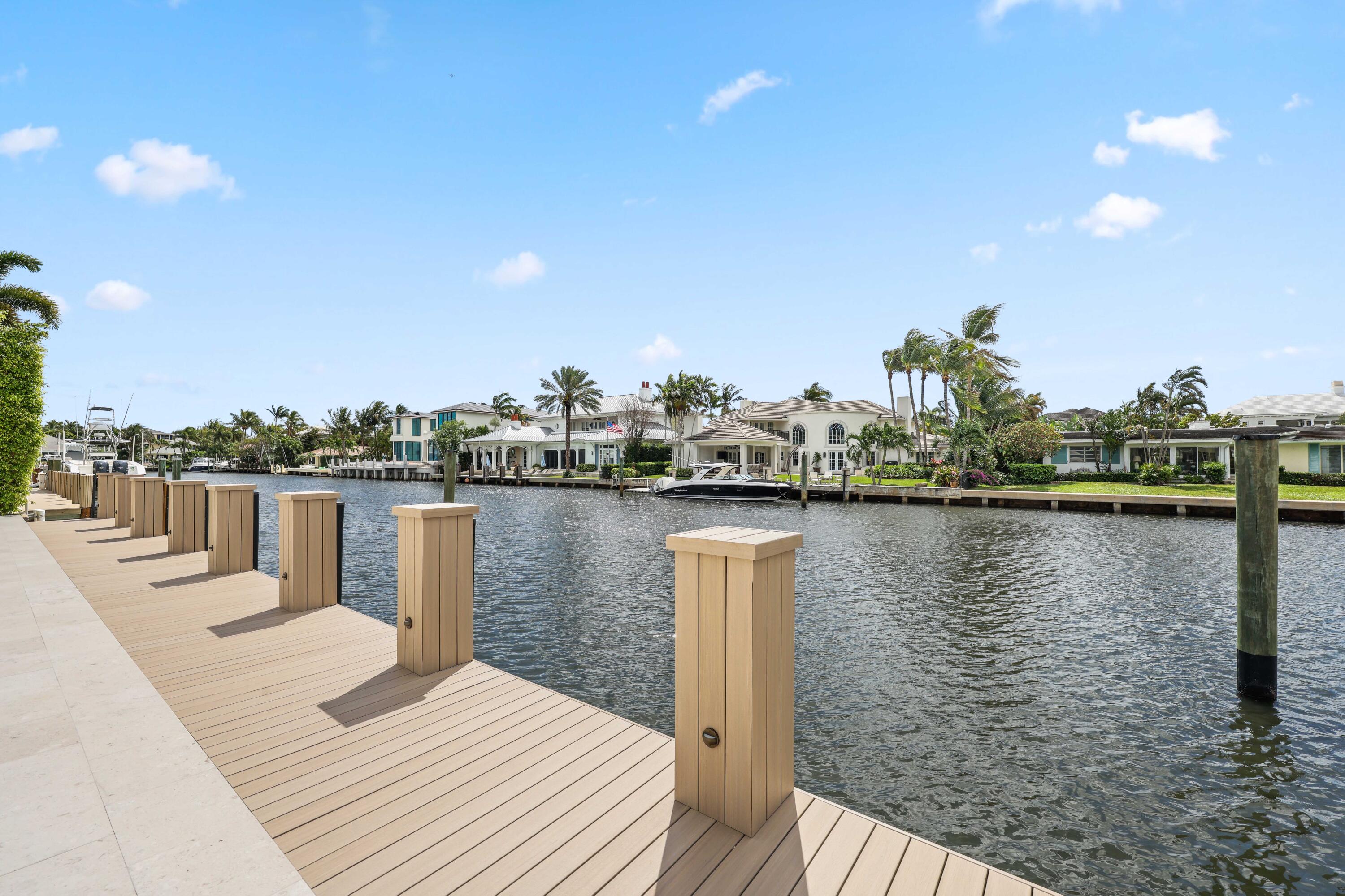 Welcome to 1102 Island Drive, a fully renovated 2025 waterfront home between the ocean and Intracoastal on Delray Beach's only true island. Offering 3,092 sqft, this 4-bed, 5-bath residence blends modern luxury with coastal living. The open floor plan connects spacious living, dining, and a sleek kitchen with Miele appliances and a gas stove, all filled with natural light. The primary suite is a private retreat with a spa, while 3 additional bedrooms offer flexibility. Set on 100 feet of waterfront along a wide canal, the property features a brand new dock and easy ocean access. Southern exposure enhances the bright interior and outdoor spaces, with a pool and patio just a short walk to the beach and Atlantic Ave.