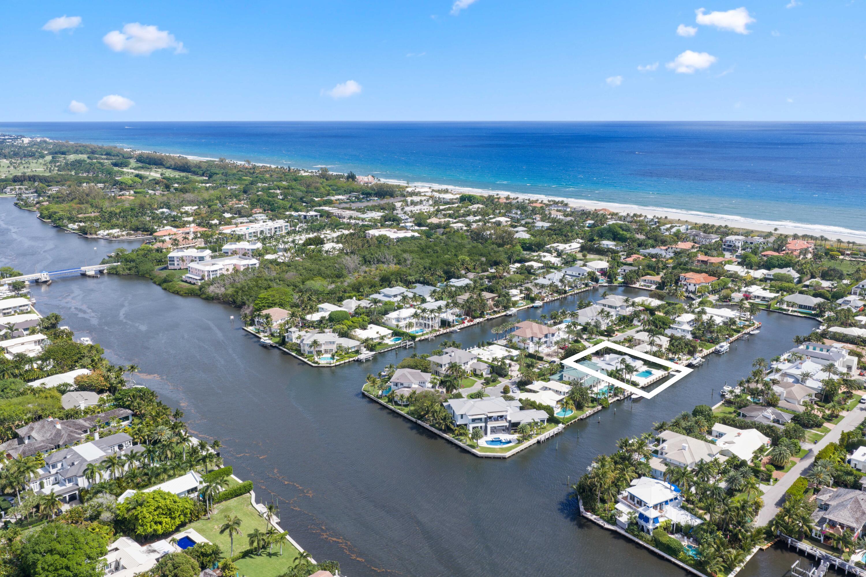Welcome to 1102 Island Drive, a fully renovated 2025 waterfront home between the ocean and Intracoastal on Delray Beach's only true island. Offering 3,092 sqft, this 4-bed, 5-bath residence blends modern luxury with coastal living. The open floor plan connects spacious living, dining, and a sleek kitchen with Miele appliances and a gas stove, all filled with natural light. The primary suite is a private retreat with a spa, while 3 additional bedrooms offer flexibility. Set on 100 feet of waterfront along a wide canal, the property features a brand new dock and easy ocean access. Southern exposure enhances the bright interior and outdoor spaces, with a pool and patio just a short walk to the beach and Atlantic Ave.