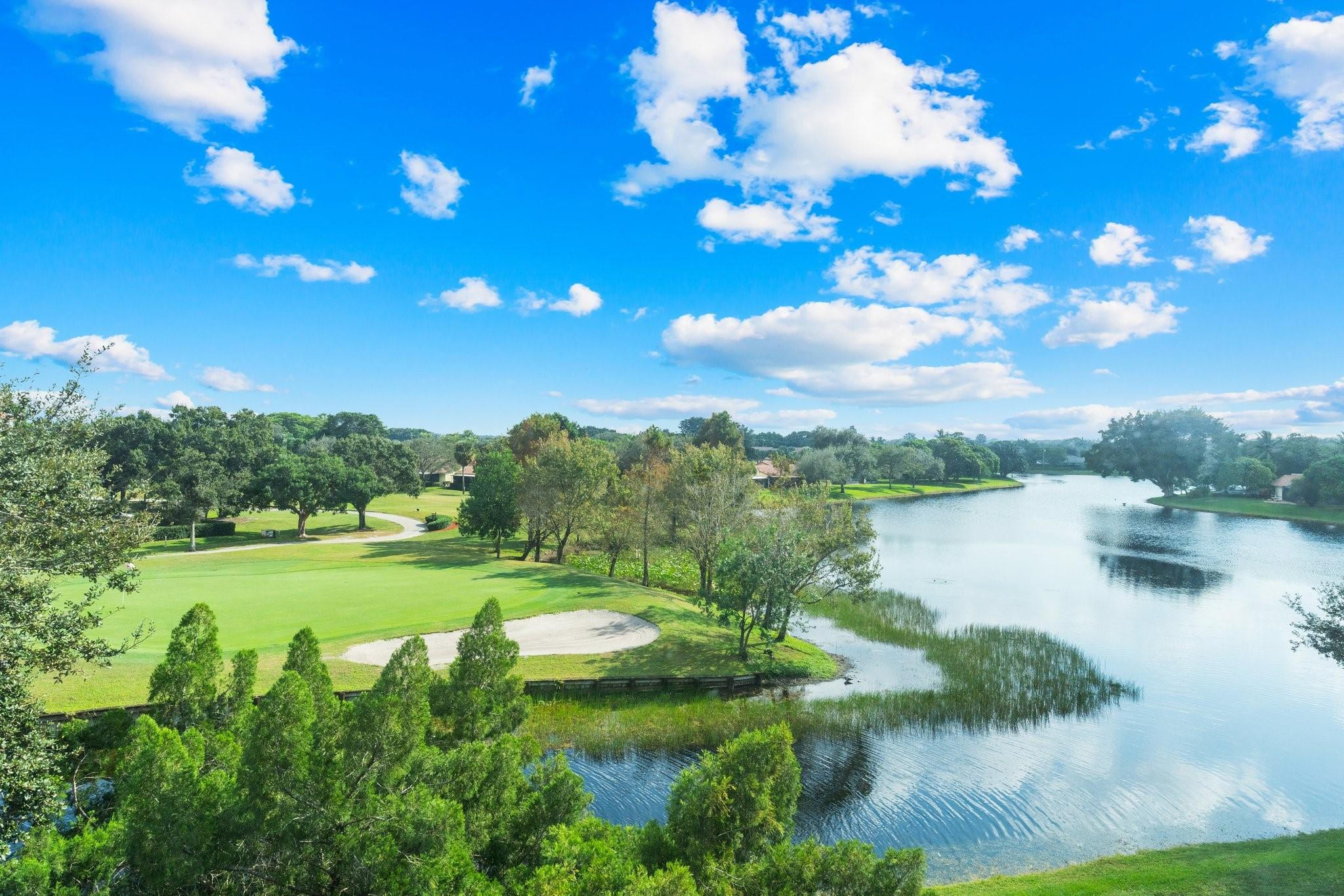Impact windows, beautifully upgraded interiors, and no minimum down payment requirement make this 2-bed, 2-bath residence a standout opportunity in the desirable Pine Island Ridge / Live Oak community. This move-in-ready unit features a remodeled kitchen and bathrooms, fresh paint, and a newer A/C for added comfort. Enjoy serene lake and golf course views from one of the best locations in the community, all within a quiet setting. Ideally located near A-rated schools, shopping, dining, and major universities, with full access to the Pine Island Ridge Country Club. Association fee includes water, internet, cable, insurance, landscaping, golf, tennis, pools, park, and a $175 annual food card.