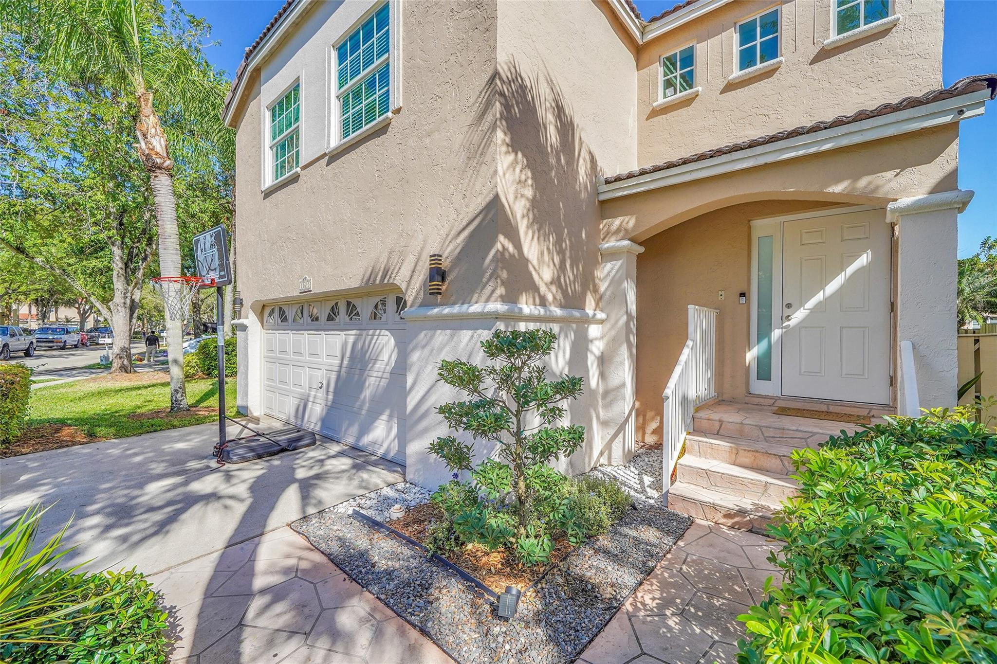 Located in the desirable Fountain Springs community, this spacious 4-bedroom, 2.5-bath home sits on an oversized lot. The converted garage offers a versatile space for a 5th bedroom, office, or playroom. Enjoy an open kitchen with stainless steel appliances and granite countertops, plus a cozy outdoor fire pit. ALL IMPACT WINDOWS and SLIDING DOORS, along with a BRAND-NEW A/C, ducts, and insulation, provide peace of mind. Upstairs, the primary suite boasts a walk-in closet with built-ins. Community amenities include a pool overlooking the lake, and nearby Deicke Park offers playgrounds, tennis, & basketball courts. Conveniently located near top-rated schools, shopping, dining, airports, and beaches! ROOF: 1992. Video Tour Available!
