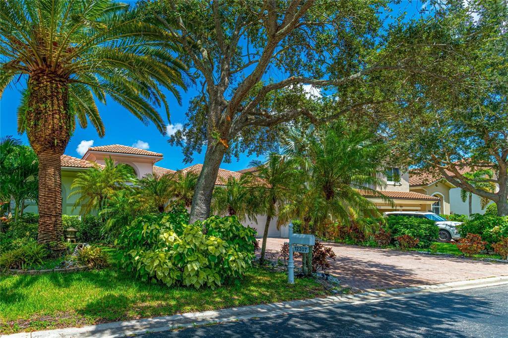 Beautifully renovated 4-bed PLUS DEN/OFFICE, 3-bath single-story home with an open layout flowing from a modern kitchen to bright, spacious living areas, enhanced by in-ceiling speakers throughout. Enjoy a private backyard oasis with a resurfaced pool and spa, lush landscaping, fruit trees and the most beautiful, serene lake views with stunning sunsets. Updates include a new kitchen and primary bath, complete impact windows/doors, perimeter security system and full backyard renovation (2021: deck pavers, pool resurfacing and plumbing, filter). Major systems: water heater (2 yrs), ACs (one Sept 2025, one 2 yrs), new pool heater. Top notch school system! A perfect blend of comfort and sophistication—South Florida living at its best.