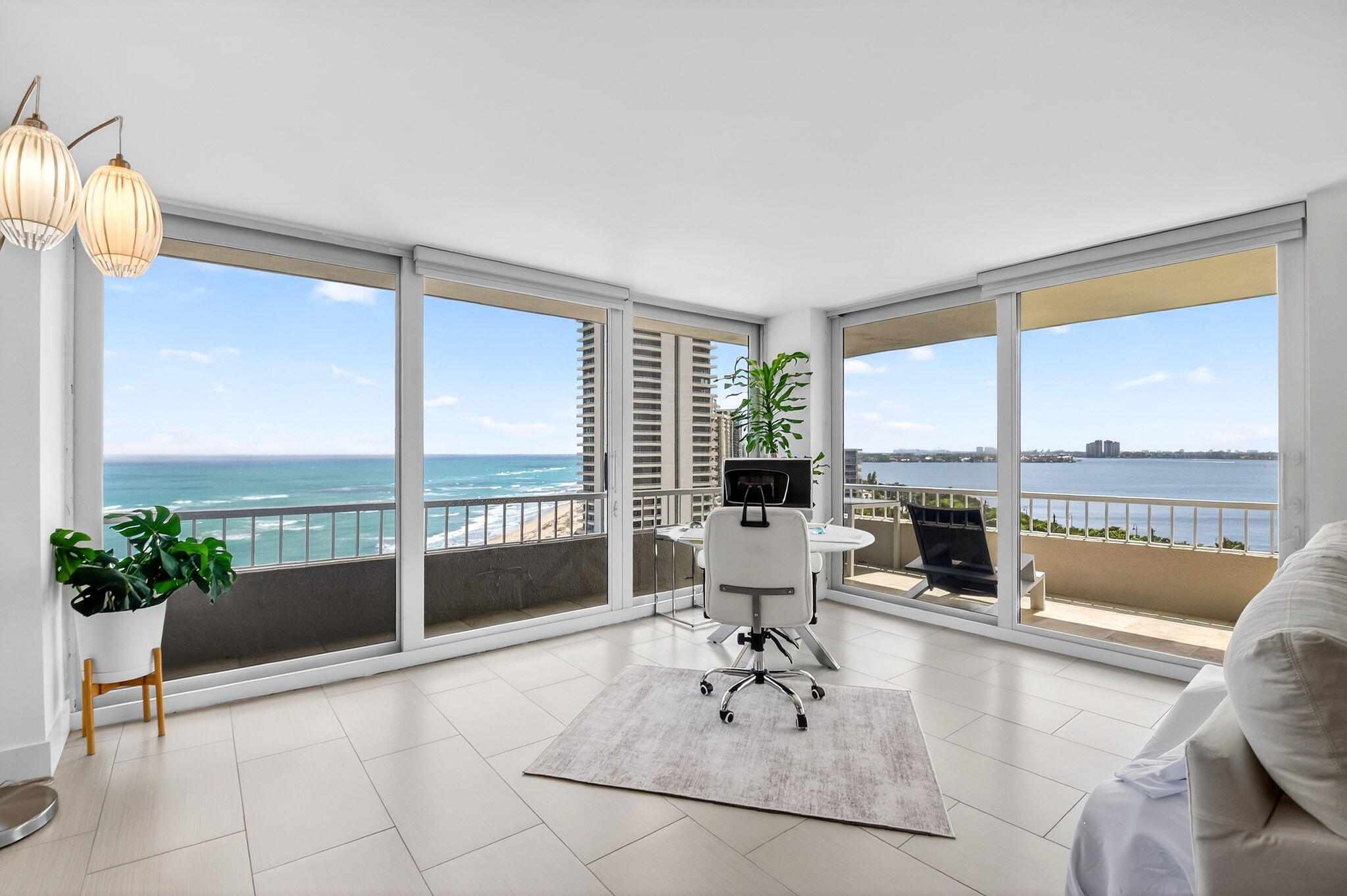 Completely renovated stunner with jaw dropping views 180 degrees, with that "you made it!" lifestyle. Enjoy sunrises and sunsets from this end unit.  Open Kitchen, double oven, coffee bar.  Beaming with natural light.   All milestone and 30 year certifications done, all work done,  no special assessments coming up so you are all set!  Impact glass completes the transformation. Small pet is welcome! Why JOIN A CLUB?  With a 1000 feet of beach frontage, Waterglades is a resort all unto its own, 24 hour gated community, 2 resort pools, putting green, 4 lighted tennis / pickle courts, community rooms, gorgeously renovated lobby.  Storage and bike storage.  Hammocks  on the pool terrace.  State of the art fitness. Meander to the award winning McArthur State Park.  Your search is complete.