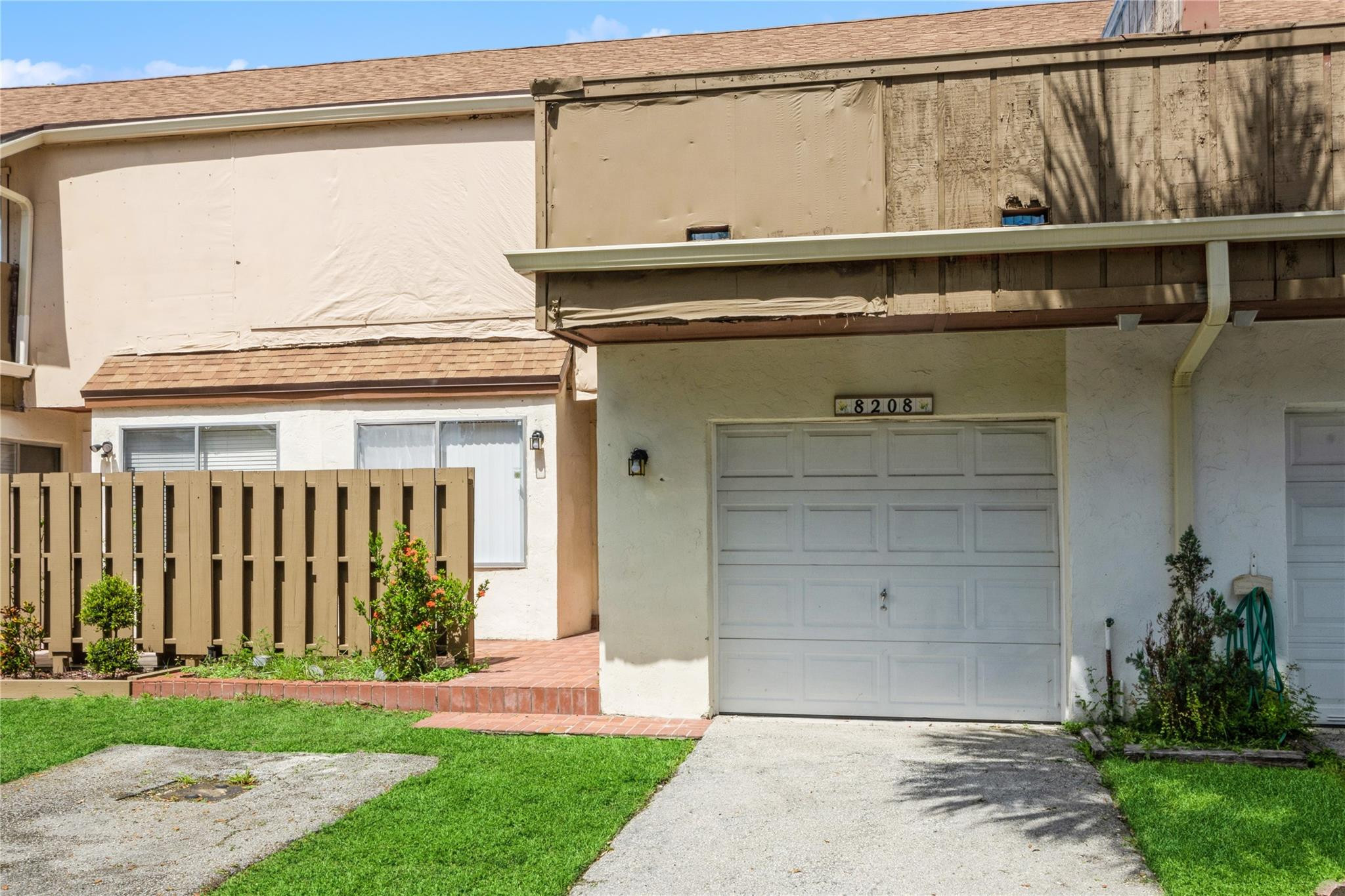 3 bed, 2.5 bath townhome, freshly painted, all bathrooms are remodeled, new wood floors upstairs and tile floors throughout the 1st floor. The converted garage has central A/C and can be used as a 4th bedroom, office, or den. HOA requires 650+ credit score & income of $55K for single and $88K for couple. HOA is resurfacing the front of the building, repaving the roads throughout community. HOA Application Rules and Regulation Construction Addendum