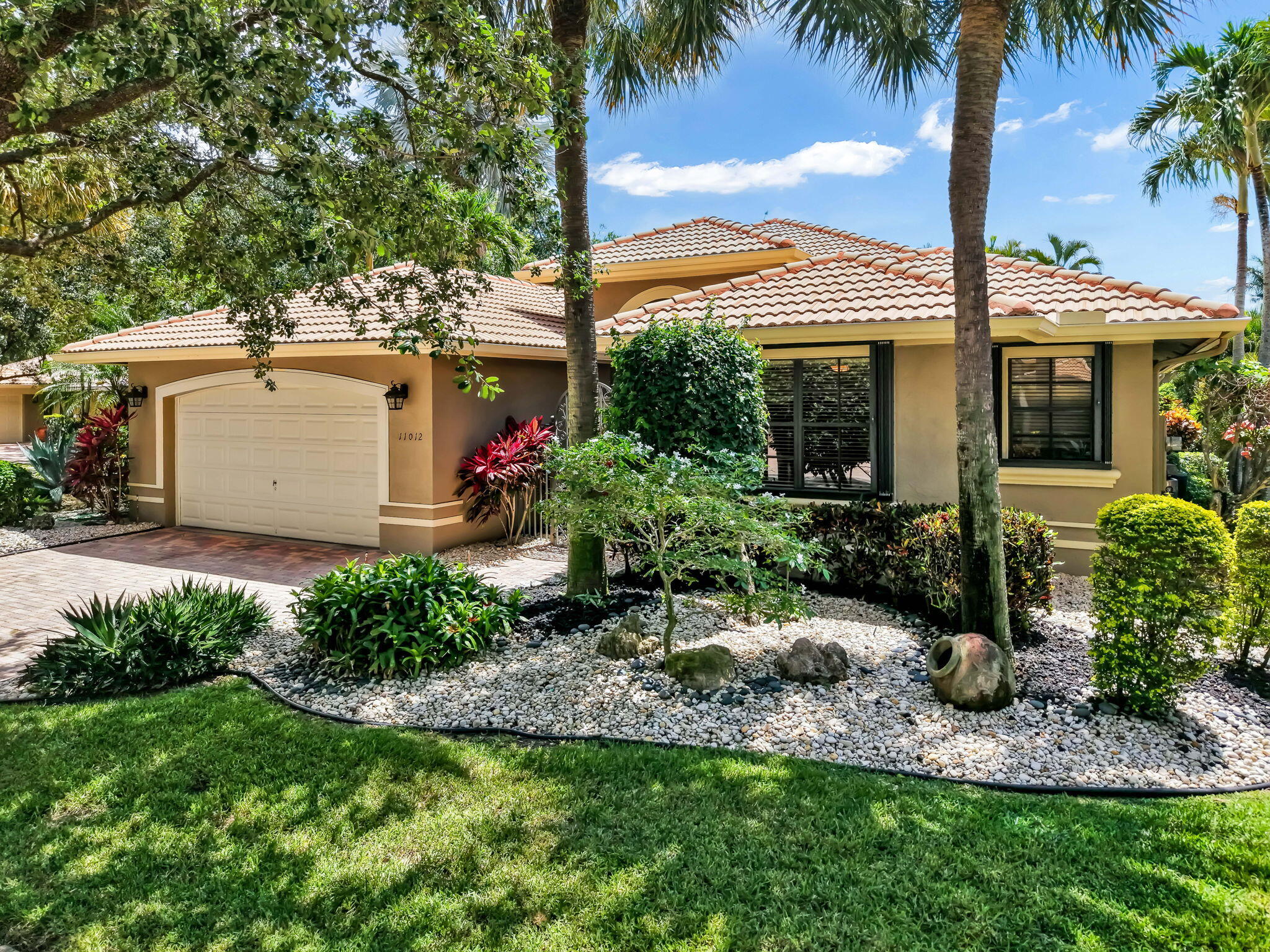 Tivoli Reserve a 55+ gated community. Exceptional corner lot this meticulously maintained Palazzo Roma model with 2,821 sq.ft under air features four bedrooms, three full-baths, two car garage & offers a seamless blend of sophistication & comfort. Desirable split-bedroom plan, the fourth bedroom w/a custom built-in murphy bed & office, creating a perfect office space. The home has a spacious chef's kitchen with quartz countertops, abundant cabinetry, and an open-concept design that overlooks the family room, creating the perfect setting for relaxing & entertaining. Additional premium features include accordion shutters, whole-house generator, whole-house water purification system. Step outside to a screened in patio & open patio overlooking a tropical oasis picturesque pond &  waterfall.