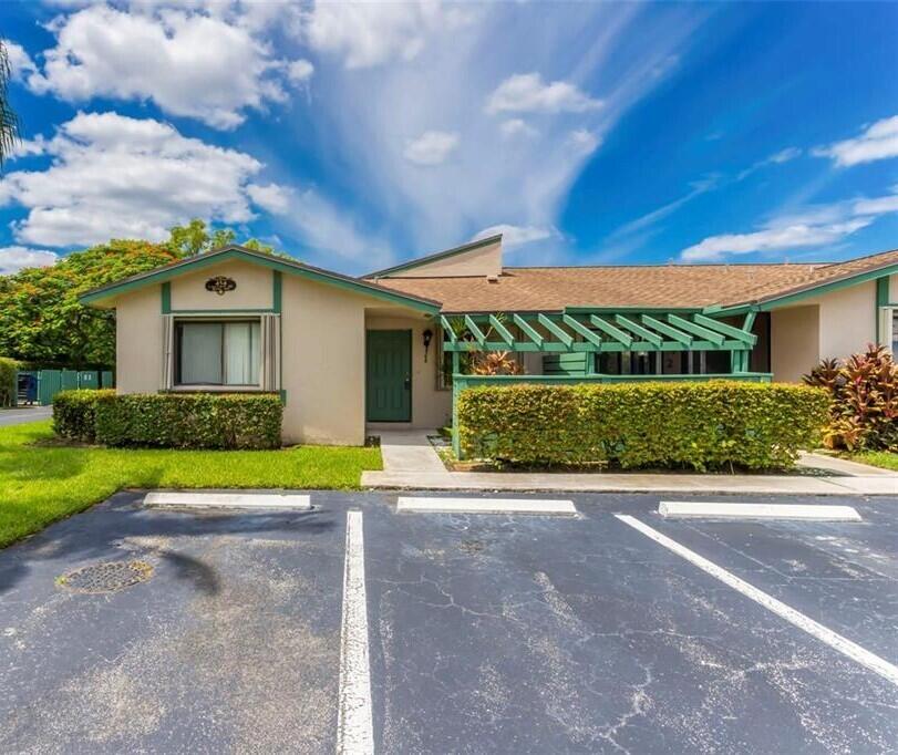 Vacant and ready for immediate occupancy, this private corner villa offers 3 bedrooms, 2 bathrooms, and comfortable single-level living in the desirable Bonaventure community of Weston. The residence features a welcoming front porch, vaulted ceilings, bright living spaces, a functional floor plan, a well-appointed kitchen and bathrooms, and a patio overlooking lush green landscaping.  The building was extensively remodeled approximately three years ago, adding to the property's appeal. A community pool is conveniently located directly across from the residence. Owners also enjoy membership to the Bonaventure Town Center Club for approximately $420 per year, offering access to swimming pools, a fitness center, bowling, billiards, basketball, tennis, and additional recreational amenities.   The association covers roof, exterior maintenance, insurance, common areas, and trash service. Located within an A-rated school district and minutes from shopping, dining, parks, Sawgrass Mills Mall, and major highways, with convenient access to the airport and beaches.   Please use Showing Time for appointments.   Submit all offers with proof of funds or pre-approval letter. Buyer and buyer's agent to verify association requirements, application process, rental restrictions, pet restrictions, parking, assessments, and all property information.
