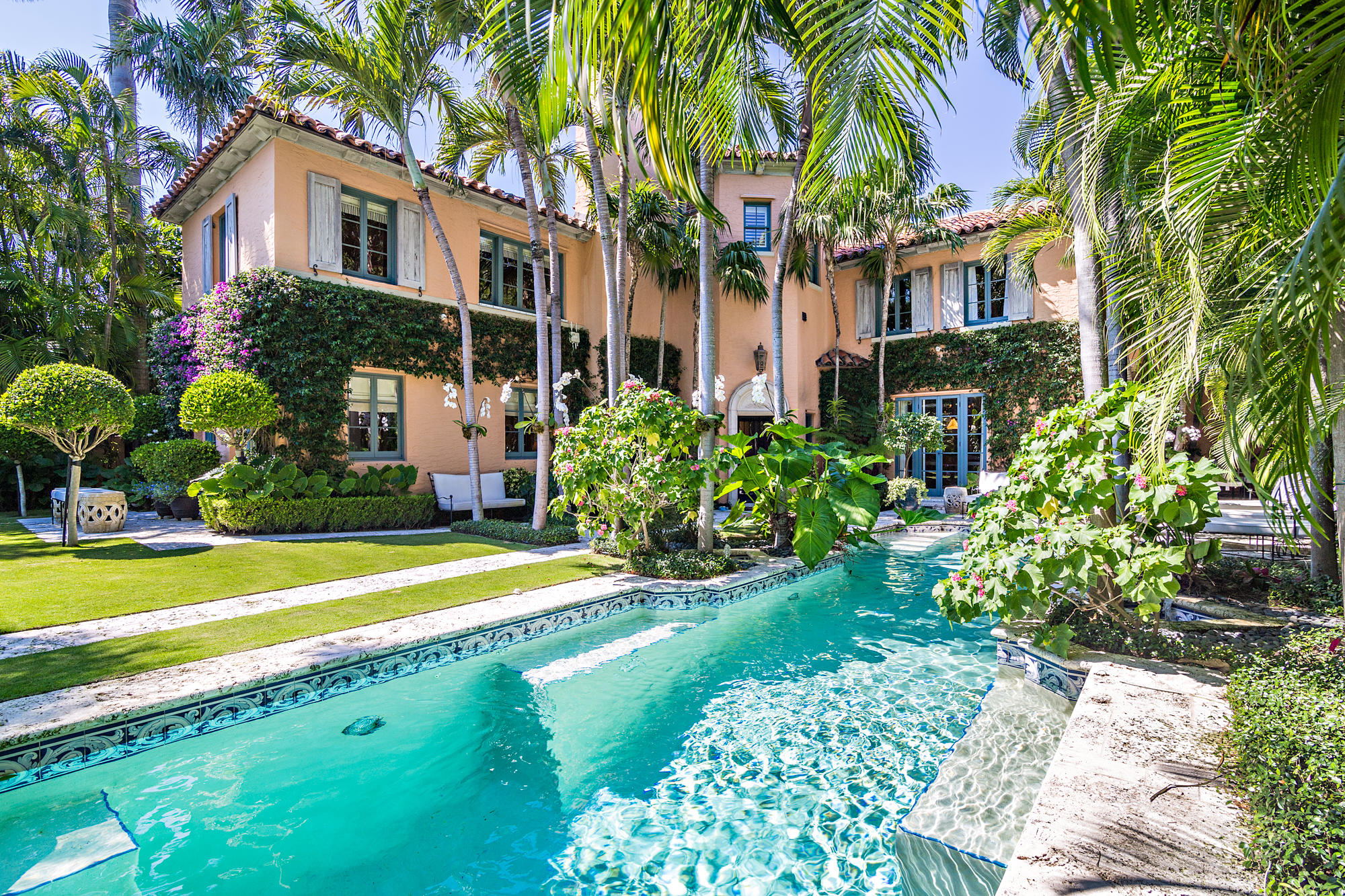 This Marion Sims Wyeth landmarked home, built in 1928, has been completely renovated to today's standards. Tucked away on Golfview Road, this house is one block from Worth Avenue, restaurants and the beaches. Impeccably designed while keeping many of the original architectural details, this house is a must see! The gardens were designed by Mario Nievera, adding to the allure of this beautiful home. With an elevator, full house generator and the two-car garage off the private alleyway, this house has it all.