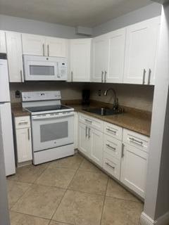 VILLAGE GREEN COVENTRY CONDO - Residential Lease