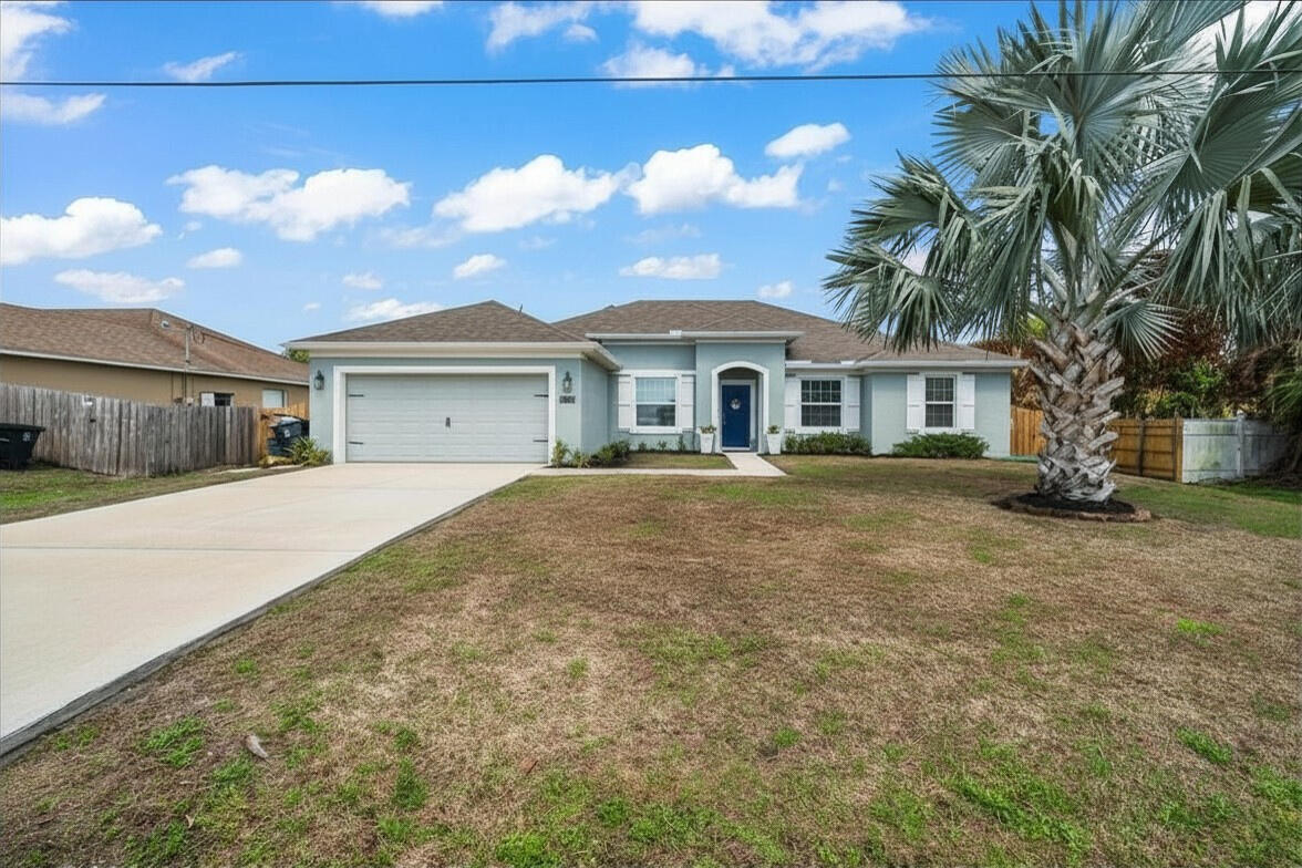Hurry you don't want to miss this one!! Beautiful 3/3 well maintained home that shows pride of ownership. This home has a great triple split floor plan. Features include shiplap walls, beamed ceiling, built in fireplace with built in cabinets on each side,  custom bathroom countertops and so much more. Open concept features a large living room, formal dining room, eat in kitchen with granite counter tops and stainless steel appliances and an additional den/office. Wood look tile throughout the living area and bedrooms. Originally a 4 bedroom home, it has been converted to a multi-generational bedroom/sitting room. The cabana bath could be used as a separate entrance for privacy. If you prefer a 4 bedroom, the room can easily be converted back or even a 5th bedroom can easily be added.  Close to parks with boat ramps, shopping centers, restaurants, entertainment, Mets stadium and golf courses.