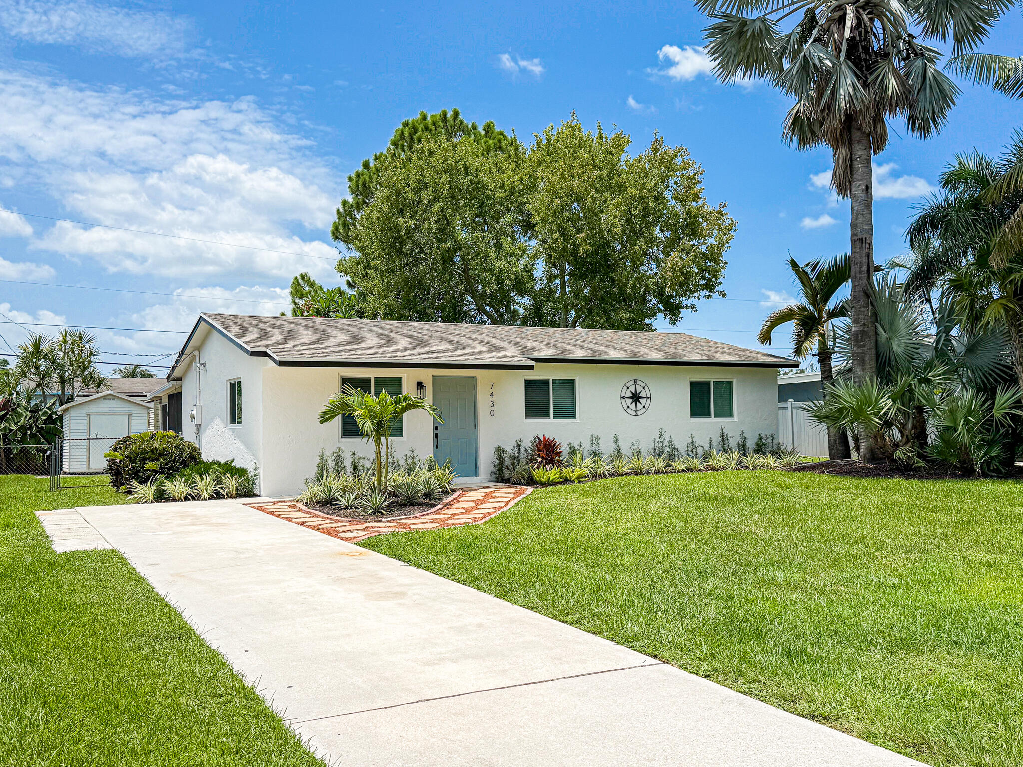 Beautifully updated 3-bedroom, 1-bathroom home in Lake Worth with NO HOA! Porcelain wood-look tile throughout, updated kitchen with new Frigidaire appliances & quartz countertops, and hurricane impact windows throughout for storm protection & efficiency. Fenced in backyard includes a storage shed equipped with electric and room for a pool! Close to shopping, dining, schools & major roadways, with the beach just a short drive away.