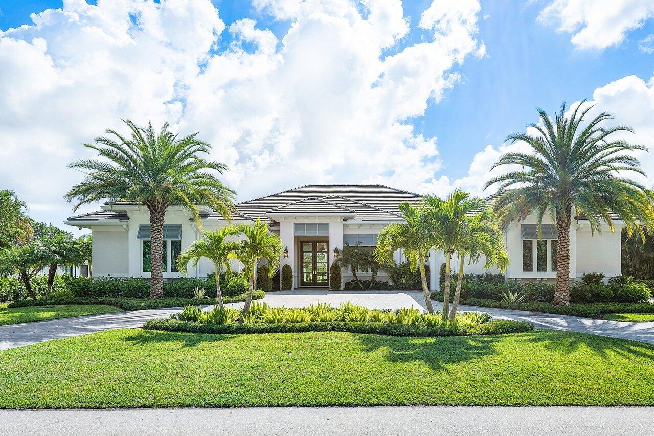 Shows like a model home, only 2 years old and offered furnished. Sited on a beautifully landscaped half-acre lot overlooking the 2nd hole of prestigious Old Marsh Golf Club. The Transitional style and luxury appointments will impress. 3 full garages and golf cart garage. Custom mahogany entry doors open to a large great room overlooking a beautiful pool and golf view. Quartz countertops, wide plank wood floors, tray, volume and box beam ceilings, recessed LED lighting, electric window blinds, custom window treatments, designer lighting fixtures and custom built-ins. Gourmet island kitchen has a Thermador double door refrigerator w/separate freezer, a 6 burner gas range w/griddle, 3 wall ovens, a large walk-in pantry, a steam oven and 2 refrigerator drawers. Previous Buyer default presents a great opportunity to own an awesome home. The owner's suite has a morning bar, two baths and two oversized walk in closets. Each of the guest suites have their own ensuite baths. Other amenities include tankless water heaters, a central vac and a 48 bottle wine cooler.  Outdoors, beyond the covered lanai is a gas heated pool with a salt system, an opulent spa and a well stocked summer kitchen. The attached two car garage has a separate golf cart access and across the circular driveway is an additional one car detached garage.  Offered fully furnished, there is truly nothing lacking in this stunning home.

And then, of course, there is Old Marsh itself, a small and exclusive, gated community, tucked away and intimate, surrounded on three sides by hundreds of acres of beautiful nature preserves that will never be developed. Old Marsh contains only custom estate homes on half-acre or larger lots, with marsh, lake or golf course views. The 18-hole championship golf course was designed by the highly renowned architect Pete Dye and consistently has been ranked one of the best in the United States. No starting times and a nationally acclaimed caddy program enrich your experience on the course. Old Marsh Golf Club, with its recently enlarged clubhouse, its warm and friendly atmosphere and its service oriented staff, has been recognized as one of the top 35 private clubs in the country and Audubon International has awarded it certification for its environmentally enhancing design.

It's not hard to picture yourself living here, in a house that is bright and elegant, in a gated community that is friendly and secure. A tranquil and private place you would be proud to call home, yet one that is still just minutes from the airport, the ocean, fine public and private schools and all of the shopping, dining, cultural and entertainment venues that the Palm Beaches offer.