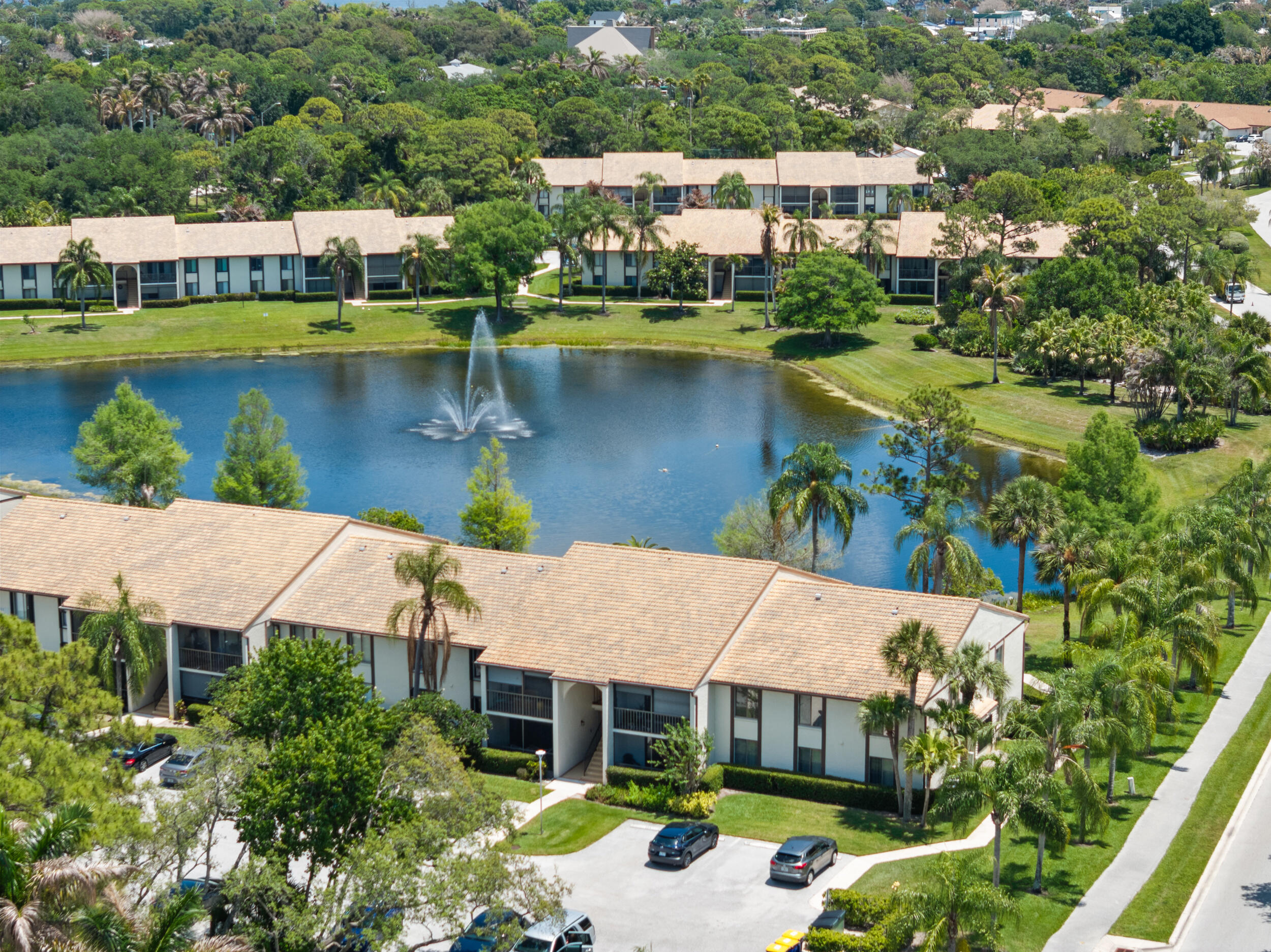 Enjoy your lake front views from this first floor unit. Updated throughout the kitchen is open and bright with ample counter space and storage. Lake views from both bedrooms and updated bathrooms make this condo move in ready. Newer AC in 22 and a tankless water heater. Community offers pool, clubhouse, tennis, pickleball and behind a gate for your privacy. "A" rated schools and just a bike ride to many shops and dinning options. Perfect for a seasonal home too.