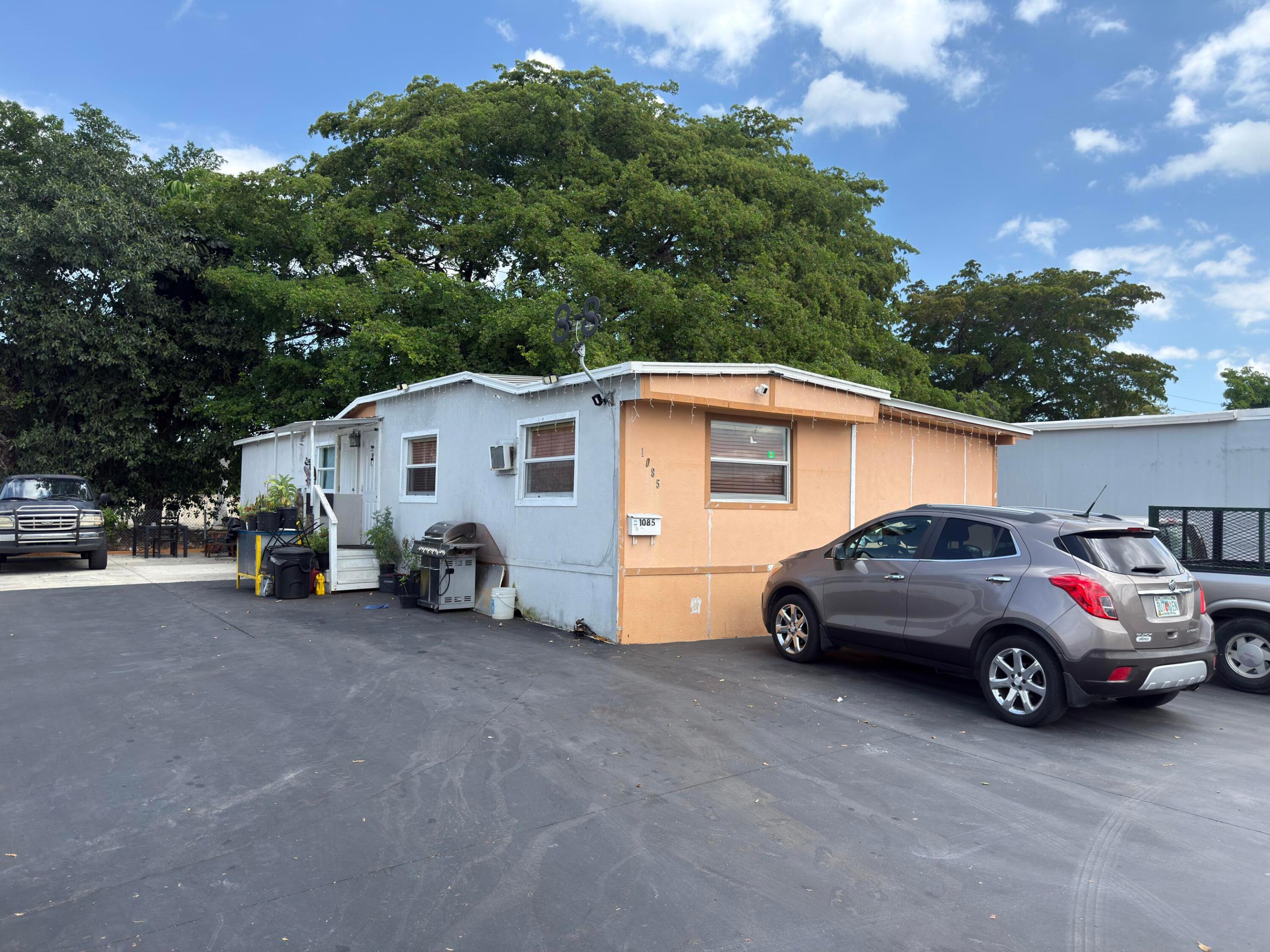 Investment opportunity in University Lakes Mobile Home Park in Tamiami. This income-producing manufactured home is currently configured with four efficiency units generating approximately $5,000/month with tenants in place. Property offers solid existing cash flow with room for cosmetic updates and rental upside—ideal for investors looking to enhance value over time.  Situated near major transit routes, everyday conveniences, and commercial areas, the location supports consistent demand for affordable rentals.  Portfolio potential available—seller owns three additional manufactured homes within the same community and may consider a package sale of all four properties.  Investor-friendly opportunity. Seller motivated. Land not included.