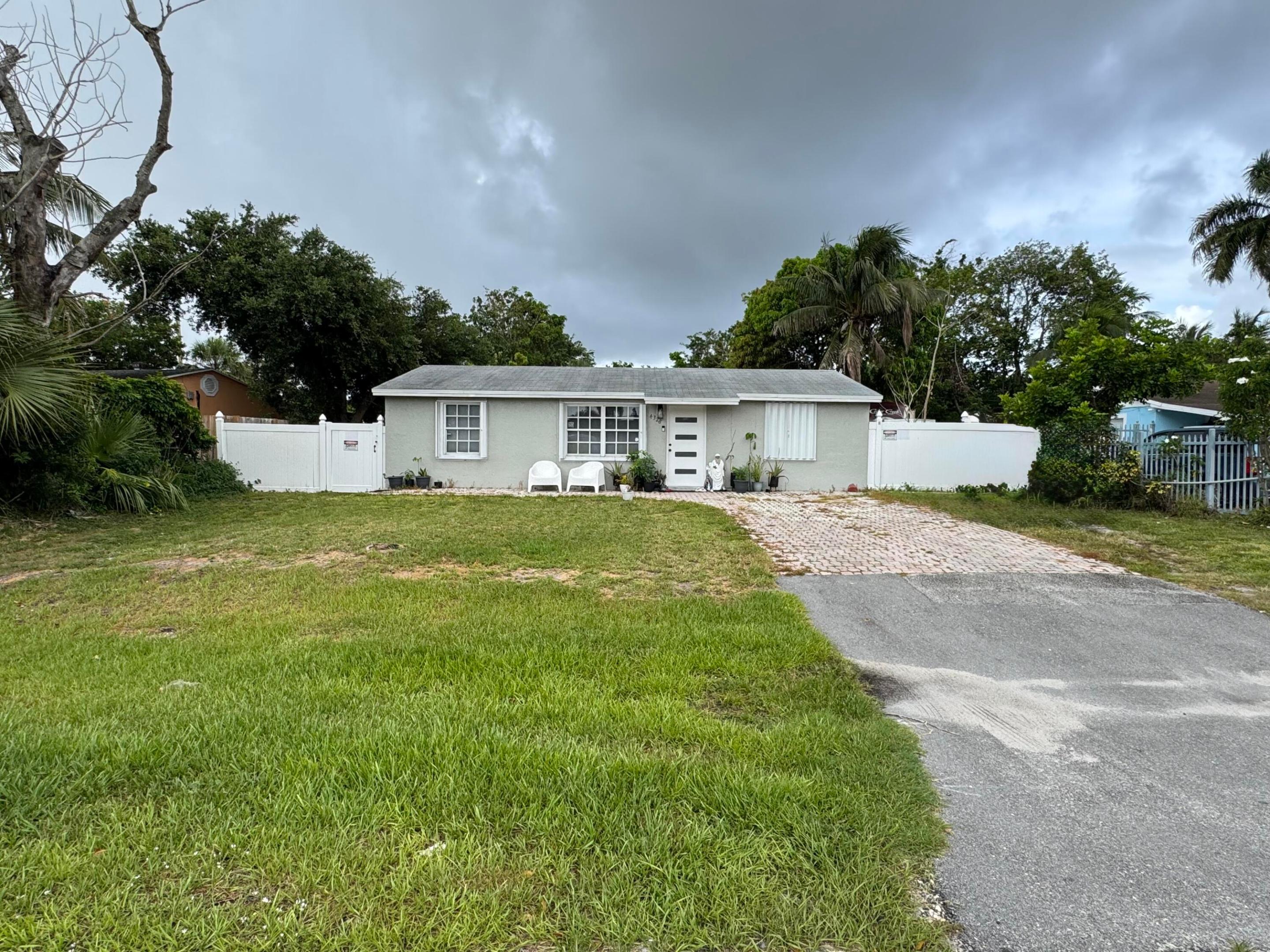 "FIRST TIME BUYERS!!! Welcome to this beautiful 3 bed/2 bath, completely remodeled inside in 2020, bathrooms, stainless steel appliances, wood kitchen cabinets and marble countertop, huge master bedroom with space for your own office, big backyard with space for a pool, your boat, or to build a guest house, lot of almost 9,000 sq ft. This beautiful gem is located in the heart of West Palm Beach, NO HOA, near popular stores, banks, and restaurants.