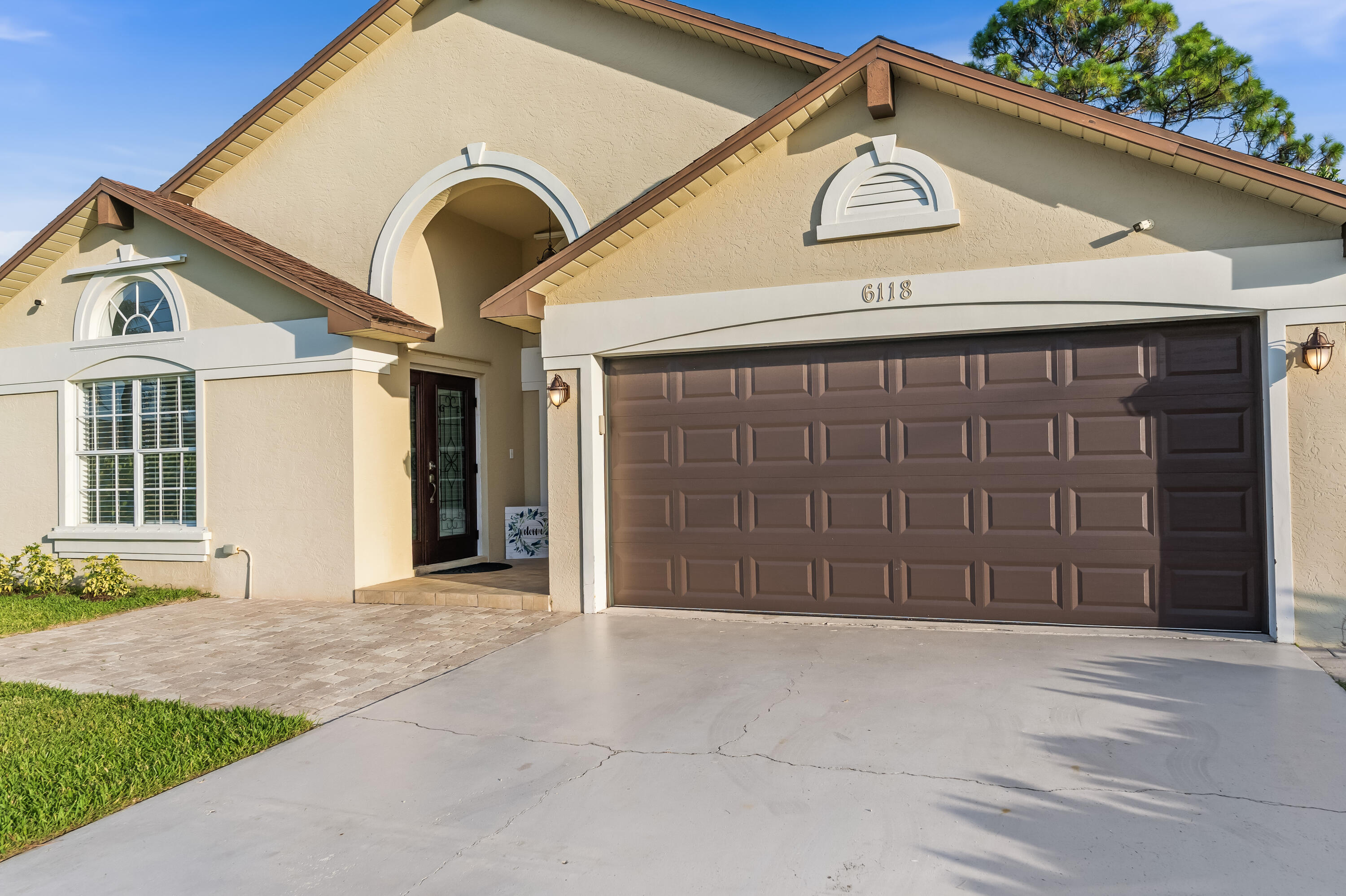 This well-maintained single-family residence is located in the desirable Heights of Jupiter neighborhood and offers approximately 1,828 square feet of living space . No HOA fees!! Built in 1993, the home features four bedrooms, two full bathrooms.   The interior showcases an open floor plan with vaulted ceilings, travertine marble flooring throughout the main living areas, and wood-look ceramic tile in the bedrooms. The updated kitchen includes granite countertops, solid wood cabinetry, stainless steel appliances, and a breakfast bar overlooking the living and dining areas.  The master bedroom features a spacious bathroom with dual vanities, and separate tub & shower. The home is located near shopping, restaurants, beaches and other area attractions.