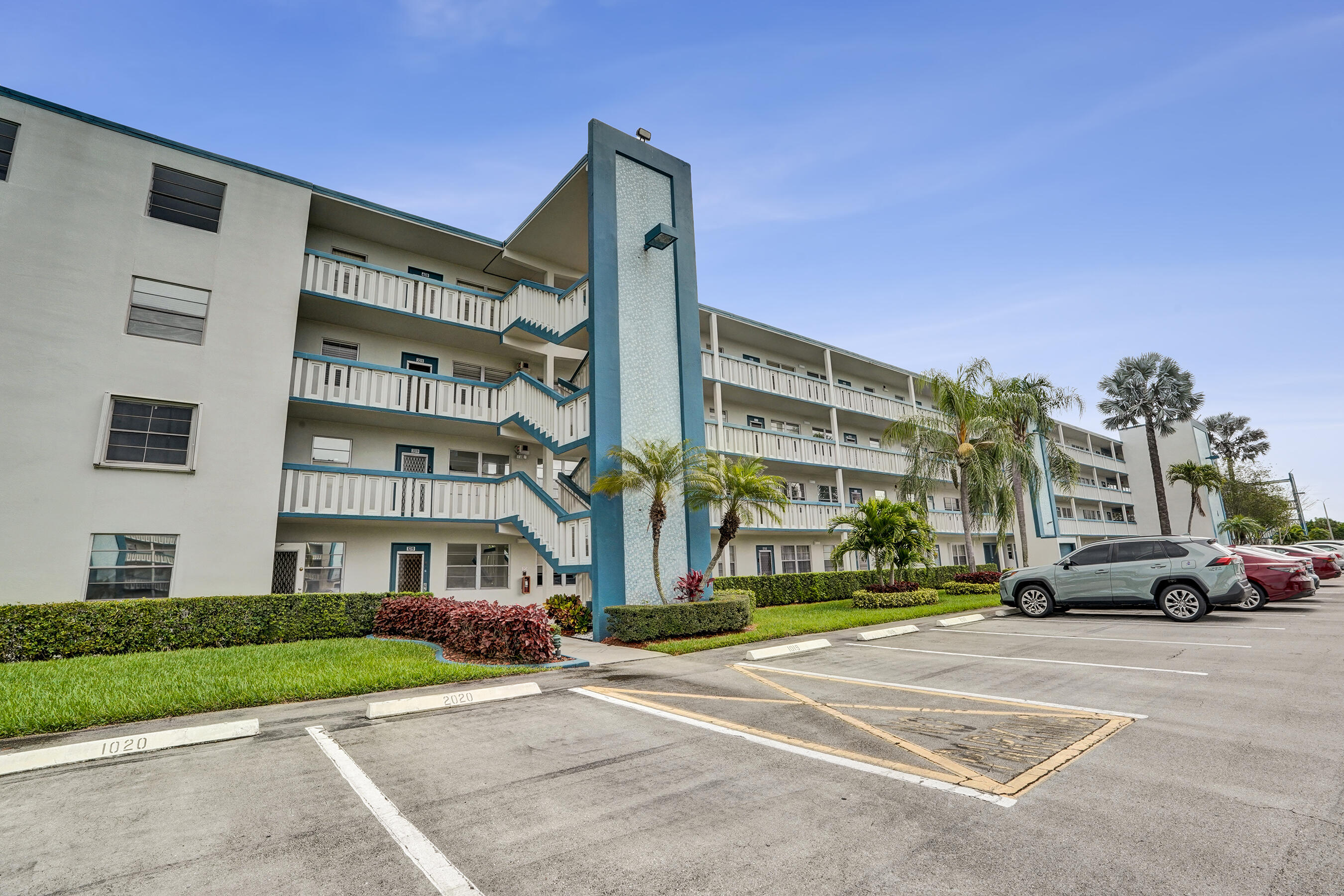 Rarely available first floor corner unit. Newer Cabinets with Granite counter tops. Main living area and second bedroom feature ceramic tile and wood tone laminate flooring. The amenities include basic cable tv, internet and wifi. Resort style living featuring fitness center, live shows, movies buses, bingo, card and game rooms, trips, tennis, pickleball, water aerobics, Friday night Dances and more. Every  section has thier own pool plus indoor and outdoor pools at the club house  Close to shopping and restaurants. Don't forget to check out the clubhouse