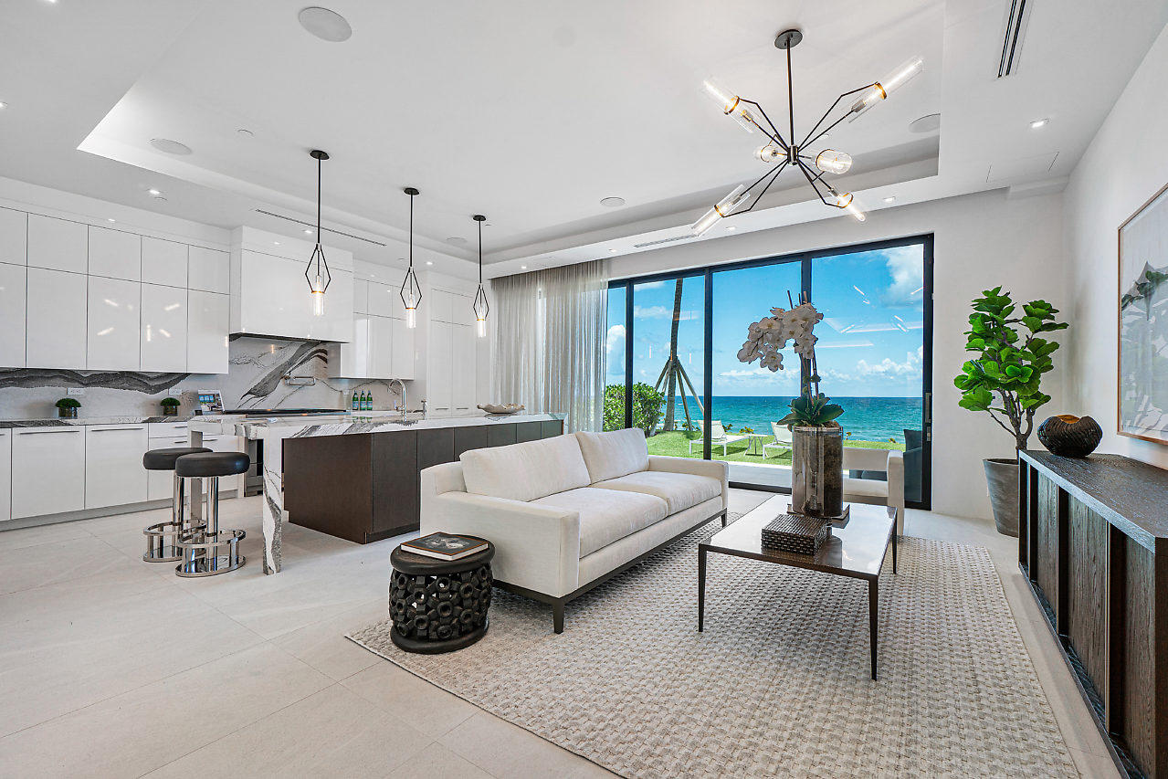 Experience the luxury of surf and sand at your doorstep and indulge in four stories of highly curated oceanfront living. This is 3621 S Ocean – Palm Beach County's most exclusive address on 200' of pristine beach frontage. Ideally located between Delray Beach & Boca Raton just 30-minutes from Palm Beach and FLL Airports! Richly-appointed interiors, lush yards, gated entry, security and cameras in every villa, private elevator, rooftop entertainment deck & in-ground plunge pool with every unit. From the jaw-dropping Miele kitchen to the jewel box living spaces framing incredible ocean views, every detail is wrapped in luxury. Smart home automation, 2-car garage and a private gated boutique presence elevate...the pinnacle of oceanfront living. Buyer to pay doc stamps and title insurance. Buyer pays doc stamps and title insurance.
