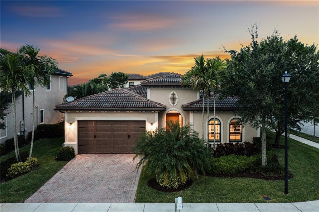 LOWEST PRICED HOME IN ALL OF WATERCREST! LIVE THE LIFESTYLE TODAY! Hurry To This 4 Beds, 2.5 Baths, Upgraded Kensington Model On Corner Lot w/Large Fenced-In Yard & Room For Pool, Popular Split Floorplan, Dream Kitchen w/Stainless Steel Appliances, Granite Counters, Double Oven, Large Island, Gorgeous Pendant Lighting, Spacious Primary Bed w/2 Walk-In Closets w/Built-In's, Primary Bath w/Separate Tub & Shower, Dual Sinks, Covered Lanai Perfect For Entertaining w/Extended Pavered Patio, All Laminate Bed Floors, Jack & Jill Bed & Bath, Upgraded Landscaping w/Soaring Colusias For Privacy. Desirable Corner Lot Directly Across The Street To Pierhouse Clubhouse w/Resort-Style Amenities! Conveniently Located School Bus Stop Across The Street At Clubhouse, A-Rated Schools, & 24-Hour Guard Gated!