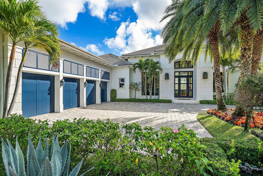 Beautiful Custom British West Indies style home in the desirable Grand Estates in Old Palm Golf Club. Spectacular panoramic views of the 9th & 18th fairways, pond & clubhouse. Marble and wood flooring throughout. Gourmet kitchen, 2 Wolf wall ovens & 6 burner gas range w/2 ovens, pantry & butlers pantry. Spacious 1st floor master bedroom w/dual bathrooms & closets. Handsome office w/built-in cabinets looking out to the swimming pool & spa. Casual & formal living areas. Covered loggia off the living room w/full summer kitchen & electronic screens is perfect for outdoor entertaining. 2 guest suites up stairs w/loft area/game room and electric screened balcony. This light & bright home offers floor to ceiling windows & over 600sf of walk in a/c storage space. 4-car garage. Don't miss this one! There are no tee times to play on this pristine signature Raymond Floyd designed course. A separate 3 hole practice studio with Trackman V-1 swing analysis makes Old Palm Golf Club the perfect golf haven for the avid golfer or beginner. Club house features fine dining, lounge, men's and women's spa, fitness center, pool with cabanas, one bedroom casitas for rent. Membership includes beach membership at the Palm Beach Hilton on Singer Island, mins to the beach and popular restaurants along the PGA corridor, Palm Beach and Jupiter.