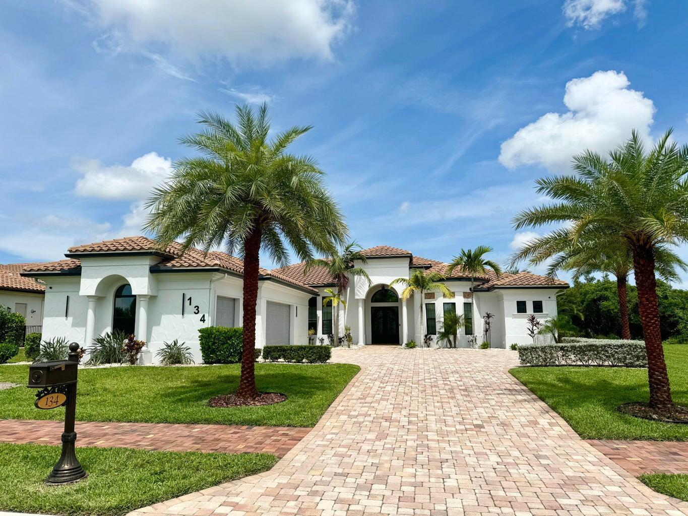 Private updated pool home located on the Island of Ravello. Constructed in 2018, this custom-built home awaits you. The safe & secure residence has storm-proof windows & doors, plus requires no flood insurance. It features a private wing for the Master Suite & an oval office. The oversized master bedroom has a tray ceiling & the sitting area. Double walk-in closets feature custom shelves with drawers in the center unit. The Master bath is light, with double vanities & a zero-edge glass shower with pebble floors. Wide-open entertainment area with expansive dining, kitchen, & family rooms. The kitchen has large bar and a walk-in pantry. The family room sliding doors allow easy access to the screened lanai & pool. The guest suites are large & share a Jack-and-Jill bath.