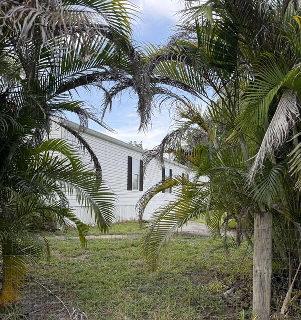Opportunity awaits!! This 3-bedroom, 1-bathroom manufactured home offers an affordable chance to own the home and YES, you own the land! (No land lease fees here!!) Situated in an all-ages community with a voluntary HOA, the property features a fenced back yard, covered carport parking, & a gigantic storage shed. While the home is in need of updating, it offers plenty of potential for buyers looking to renovate, invest or create a home of their own. Bring your vision- the attached unfinished bonus room with existing drywall, plumbing stub-out, leaves room for finishing touches & potential for additional usable space or workshop! The home is in need of work/updates and is priced accordingly, making it an excellent opportunity for investors, renovators, or buyers looking to build equity.  Sold As-Is. Central A/C.