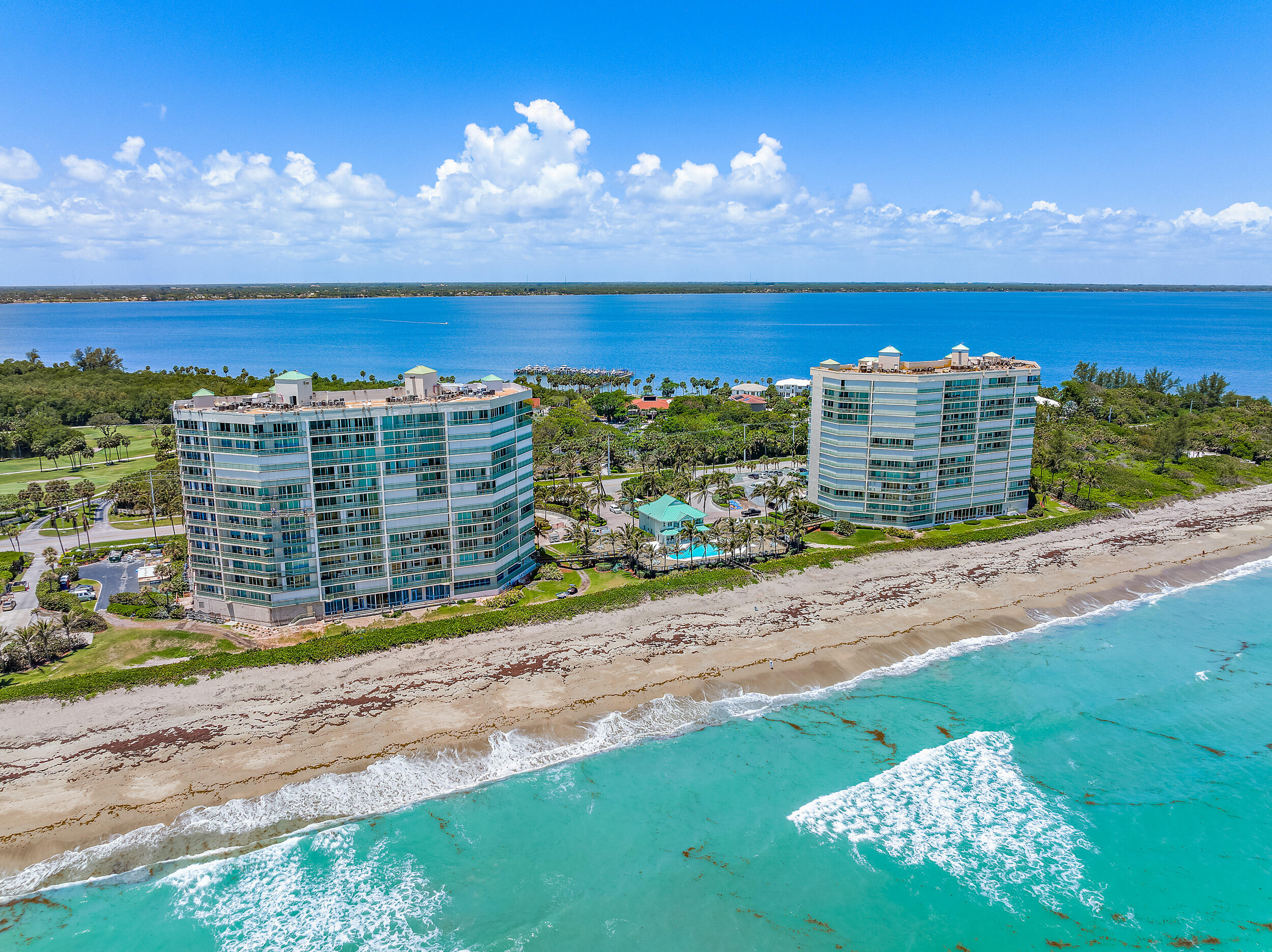 This spacious SE Corner, ''Ascot'' model at the Regency Island Dunes offers over 2,800 SF of luxury living with stunning ocean views. One of the largest units on Hutchinson Island, this 3-bed, 2.5-bath condo features a beautifully updated primary bathroom and plenty of space to relax and entertain. Regency residents enjoy unparalleled amenities, including 24-hour manned security, oceanfront social, exercise, billiard, and card room, under-building garage parking, A/C storage room, and a heated oceanfront pool with hot tub. With private beach access and all-inclusive membership to the Island Dunes Country Club, you'll have access to a 9-hole golf course, tennis courts, pickleball, riverside dining, and a marina. Live the dream at the Regency, where luxury meets convenience in one of the most sought-after locations on Hutchinson Island.