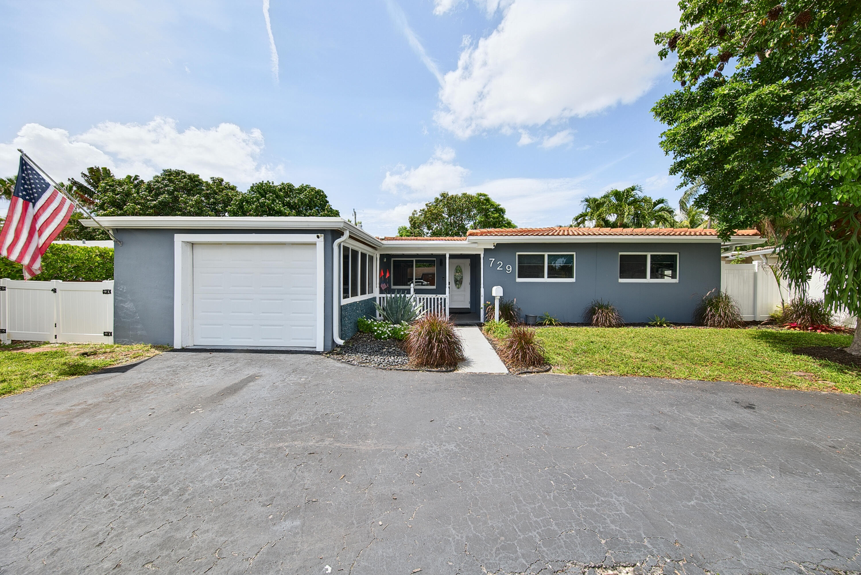 Beautiful 3-bedroom, 2-bath home with a private backyard oasis featuring a sparkling saltwater pool in a desirable Wilton Manors neighborhood. This inviting home offers impact windows and doors throughout, vaulted beamed ceilings, a cozy wood-burning fireplace, and a bright, open layout ideal for everyday living and entertaining. Enjoy indoor-outdoor living from the screened patio overlooking the pool. The home also features an updated kitchen, newer bathrooms, a PVC-fenced yard, and a garage. Conveniently located near shopping, dining, parks, and local amenities.