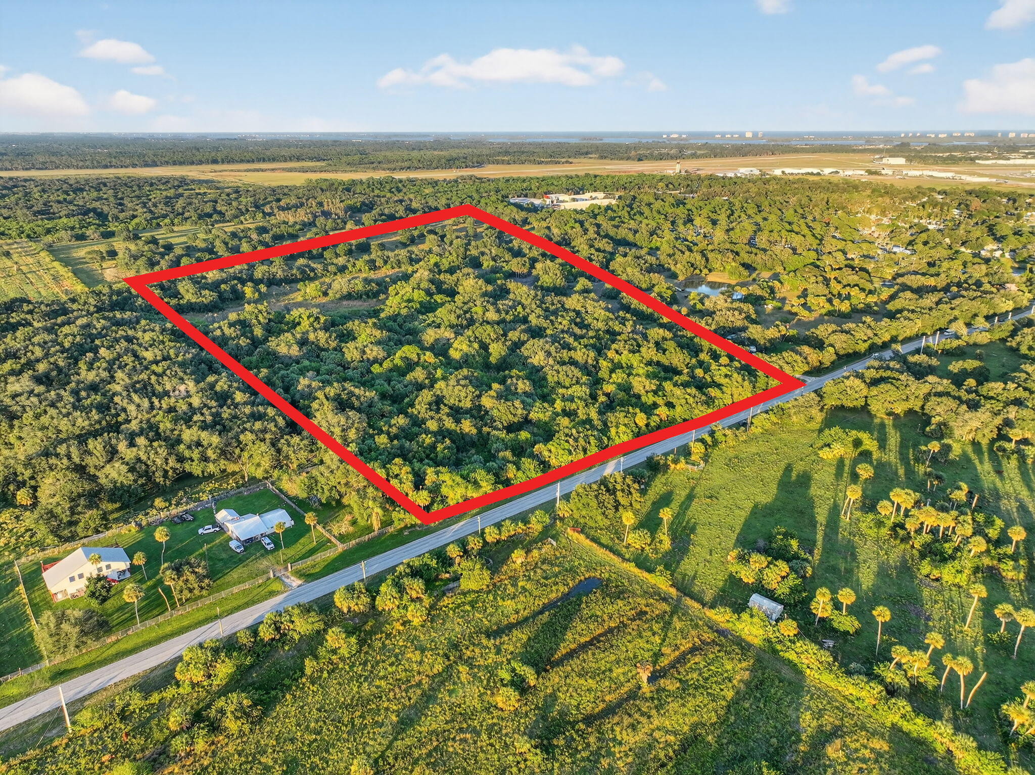Located in the St. Lucie Foreign Trade Zone, 21.98 Acres Zoned Industrial Light by St. Lucie County.    1.2 Miles from Entrance to Treasure Coast International Airport and Business Park. A standout choice for manufacturing, logistics and transportation hubs, light industrial operations, freight and cargo services, and heavy equipment storage offering exceptional potential for a wide range of development opportunities. This parcel provides an unmatched opportunity for developers and investors to leverage the strong and accelerating demand for industrial properties in this expanding region. Easy access to I-95 and U.S. Highway1. Prime location on the same street as Treasure Coast International Airport, Maverick Boat Group, Pursuit Boats,East Coast Truss and Treasure Coast Vault.
