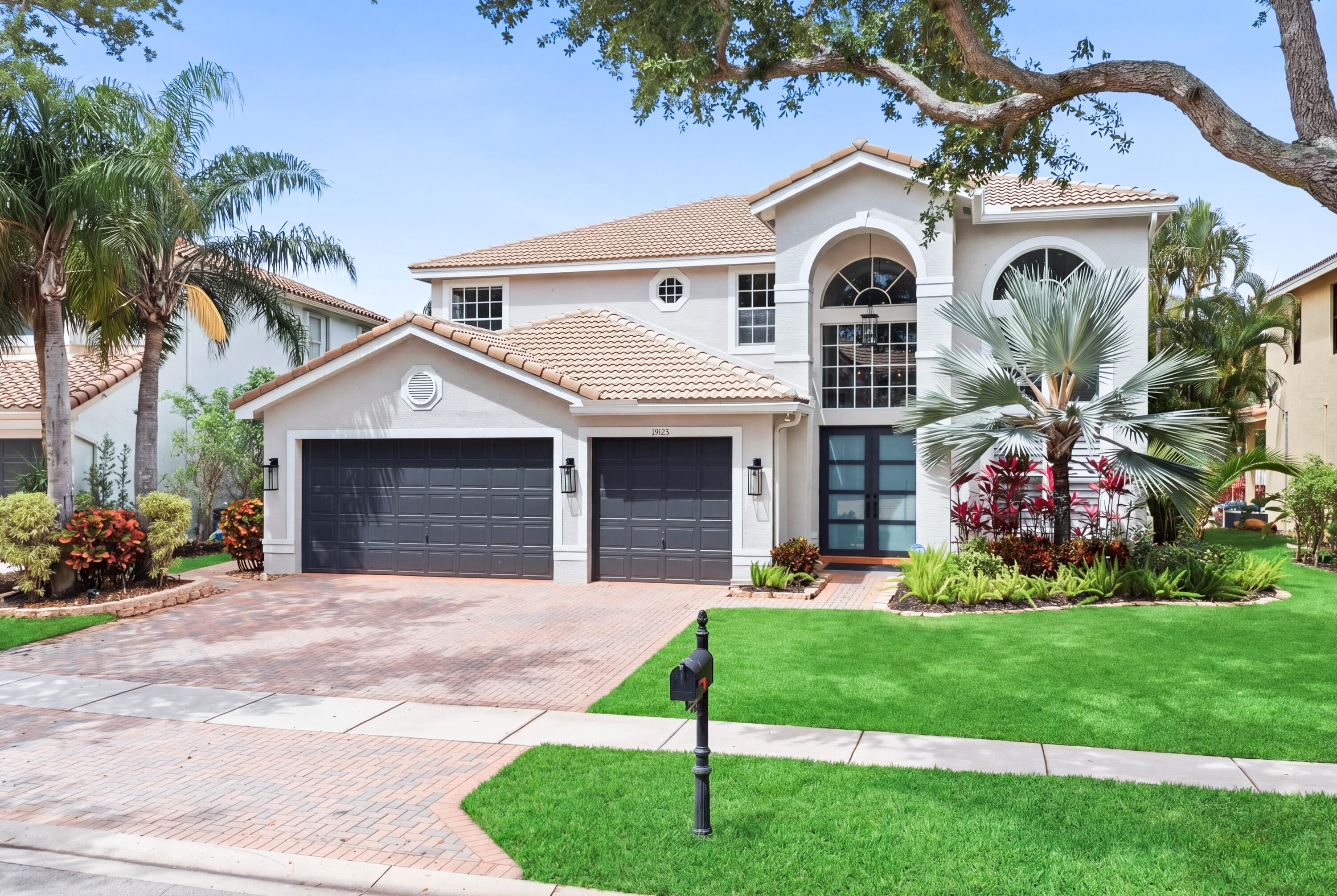 Welcome to this stunning two-story lakefront masterpiece in Boca Raton's coveted development, Saturnia. Upon entering, you'll find a well-lit, airy modern space, boasting high ceilings, designer-detailed updates throughout, and sweeping views of the lake and modern pool. As you reach the top of the grand staircase you'll encounter 3 sizable bedrooms, a full bathroom with double-sinks, and a large loft which oversees the formal living room and entryway downstairs. The expansive first-floor primary suite features walk-in closets, a large en-suite bathroom, an additional sitting area with Bay windows, and private access to the pool. The two car garage is just past the laundry room's brand new LG ThinQ SMART front loading washer and dryer and sink. Residents can easily... entertain with the open concept eat-in kitchen and living area. The living room opens to the backyard, offering the desirable indoor-outdoor Florida lifestyle. Just outside the sliding doors you'll be presented with the backyard lounge, a sandblasted marble patio, pet-friendly turf, and the star outdoor feature: the resort-style pool. The new, modern 14x32 heated and chilled pool and 14x7 champagne spa is tiled in slate, which overlooks the long view of the lake and the most gorgeous sunsets in Boca Raton. Saturnia is a manned-gated community including a fitness center, tennis courts, beautiful lap pool, clubhouse, playroom, moments from top-rated schools, parks, dining, shopping, and entertainment. You too can live this paradise-life in Boca Raton... Call to schedule your private showing today!