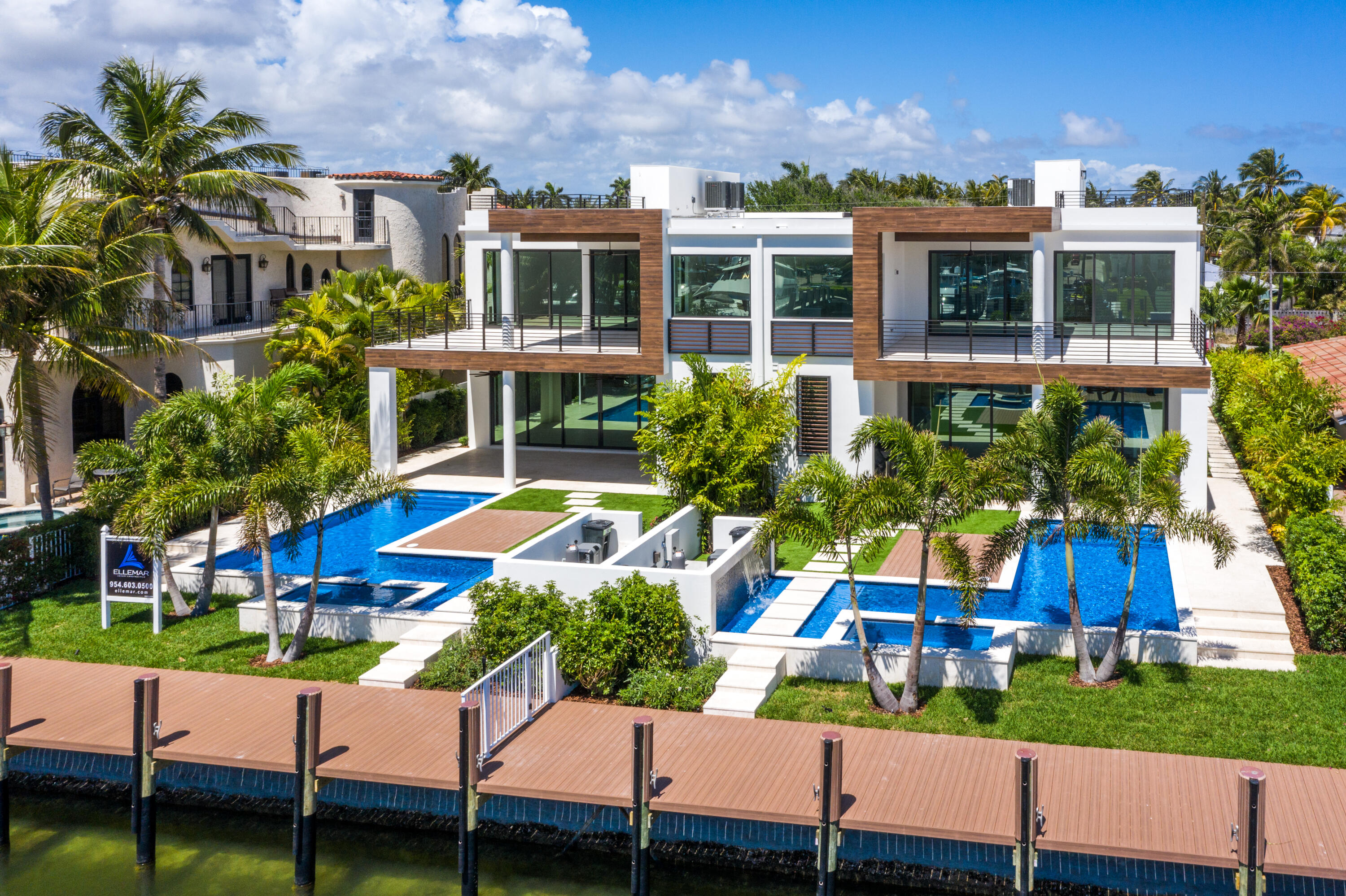 ONLY ONE LEFT!
Brand-New Coastal Contemporary Homes by Ellemar Luxury Construction sited minutes to the Hillsboro Inlet.

This rare waterfront home includes luxe amenities such as a two-bay garage and large open great room plan. Light filled interiors compliment the open gourmet chef's kitchen with top of the line appliances.

Luxurious second level master suite with large private balcony and an expansive third level sky deck. Outdoor entertaining is enjoyed at the resort style pool with spill-over spa and outdoor summer kitchen.

Full service yacht dock for the avid boater. Five(5) additional parking spaces deeded across the street for plenty of guest parking!