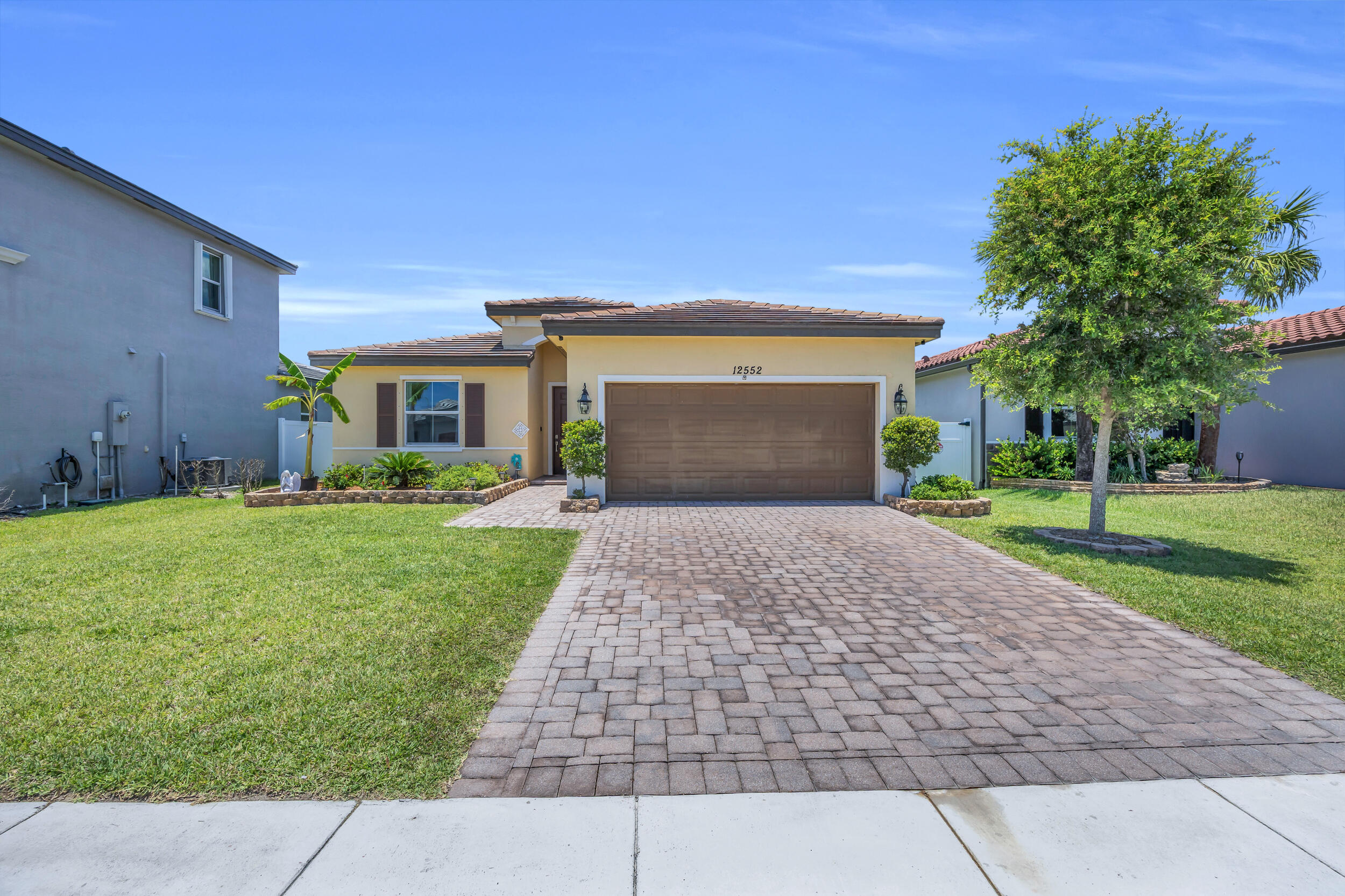 Beautifully maintained 3BR/2BA CBS home in the desirable Copper Creek community. Built in 2019, this move-in ready home features an open-concept floor plan, updated kitchen with stainless steel appliances and ample  cabinetry, no carpet and a spacious primary suite. Enjoy custom touches including an electric fireplace, built-in bar, and updated bathrooms. Step outside to a fully fenced backyard with a custom built in outdoor kitchen/bbq, perfect for entertaining.