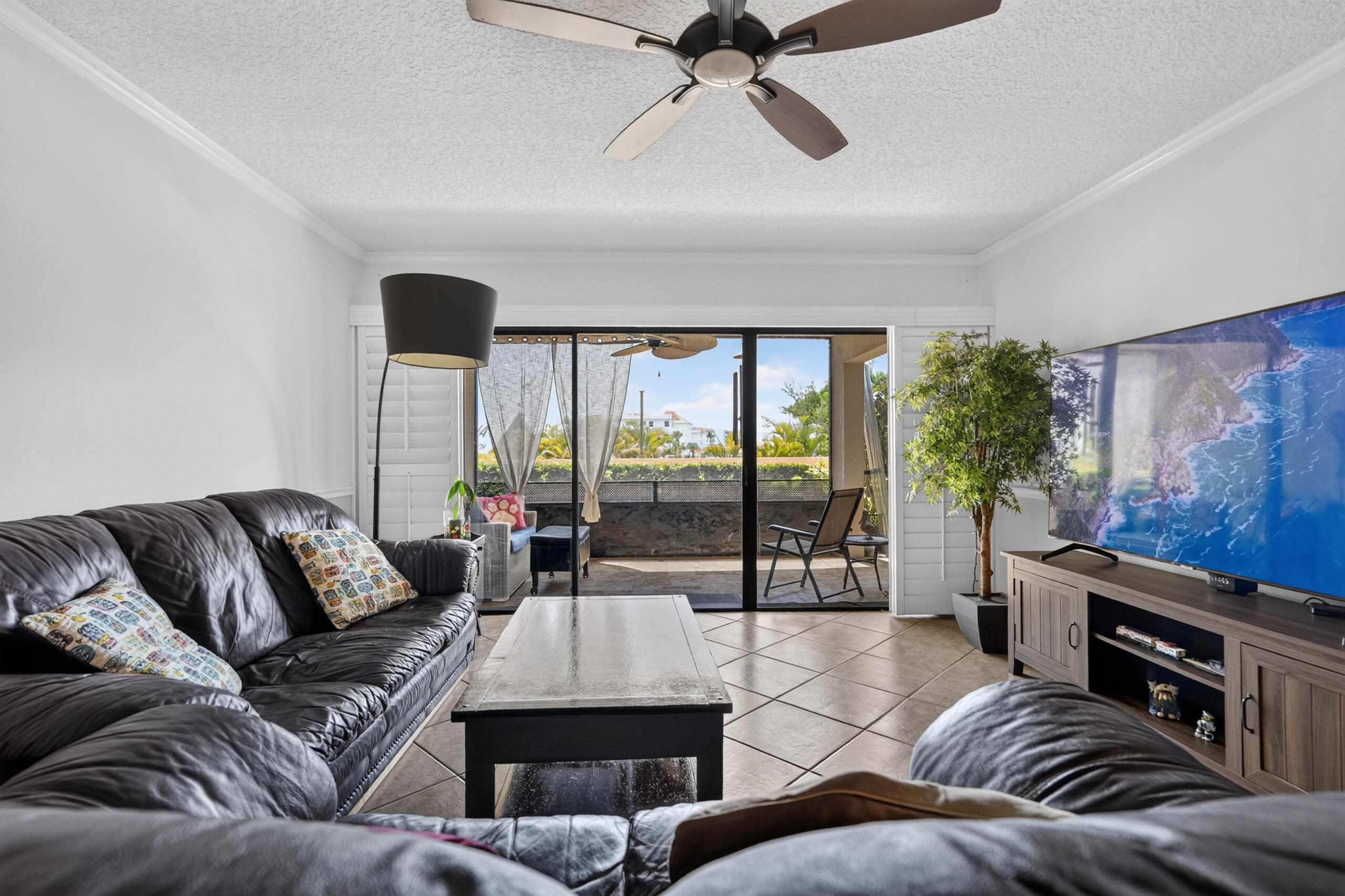 Come be a part of waterfront living at Marina Bay! This spacious first-floor 2-bedroom, 2-bath condo offers over 1,300 square feet of comfortable living with a desirable split-bedroom layout and peaceful marina views from the screened patio. The kitchen is appointed with granite countertops, custom wood cabinetry, stainless steel appliances, and a breakfast bar, while the open living and dining areas provide an inviting space to entertain or unwind. Plantation shutters, generous storage, covered parking, and a thoughtfully designed floor plan make everyday living effortless. Ideally located in the heart of North Palm Beach, Marina Bay offers a community pool and is just minutes from world-class boating, beaches, golf courses, waterfront dining, shopping, and major roadways. There are no current or upcoming assessments!