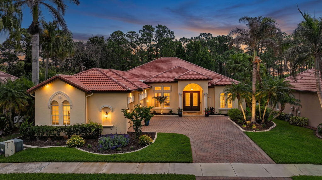 Welcome to this spacious single-story residence in the Vineyards community of Port St. Lucie, offering 2,692 square feet of finished living space perfectly suited for modern living. This four-bedroom, three-bathroom home provides ample room for comfort and convenience, with a three-car garage offering excellent storage and vehicle accommodation. The open layout maximizes the usable square footage, creating flexible spaces that adapt to your lifestyle needs. Situated on one level, this design eliminates stairs and simplifies daily living while maintaining the privacy and separation that multiple bedrooms and bathrooms provide. This Port St. Lucie home represents an excellent opportunity for those seeking substantial square footage and thoughtful floor planning in an established community. Please see the property details for the residence in The Vineyards at St. Lucie West below:  This turnkey home makes a striking first impression with a travertine tiled entry, lush landscaping, and custom double impact-rated glass front doors. Inside, formal living and dining spaces offer timeless elegance. The living room features expansive sliding glass doors that create a seamless transition to the outdoor living area and tranquil preserve views.  The fully renovated kitchen showcases custom cabinetry, new appliances, and luxurious Quartzite countertops, which are featured throughout the home. A separate bar area has been redesigned with matching cabinetry and countertops for added style and storage.  All four bedrooms feature porcelain tile flooring. The primary suite serves as a retreat with large-format 2' X 4' porcelain tile, dual closets, and a redesigned spa-inspired bathroom. One secondary bedroom includes a private en-suite bath, while the remaining two share a well-appointed full bathroom. All bathrooms include quartzite countertops, new custom cabinetry, lighting, and updated showers.  Conveniently located just two miles from I-95 and minutes from the FL Turnpike and US-1, this home offers luxury, privacy, and accessibility. The St. Lucie West community is features major shopping plazas, and diverse dining options. Additionally, the property is just minutes from local boat ramps and beaches.