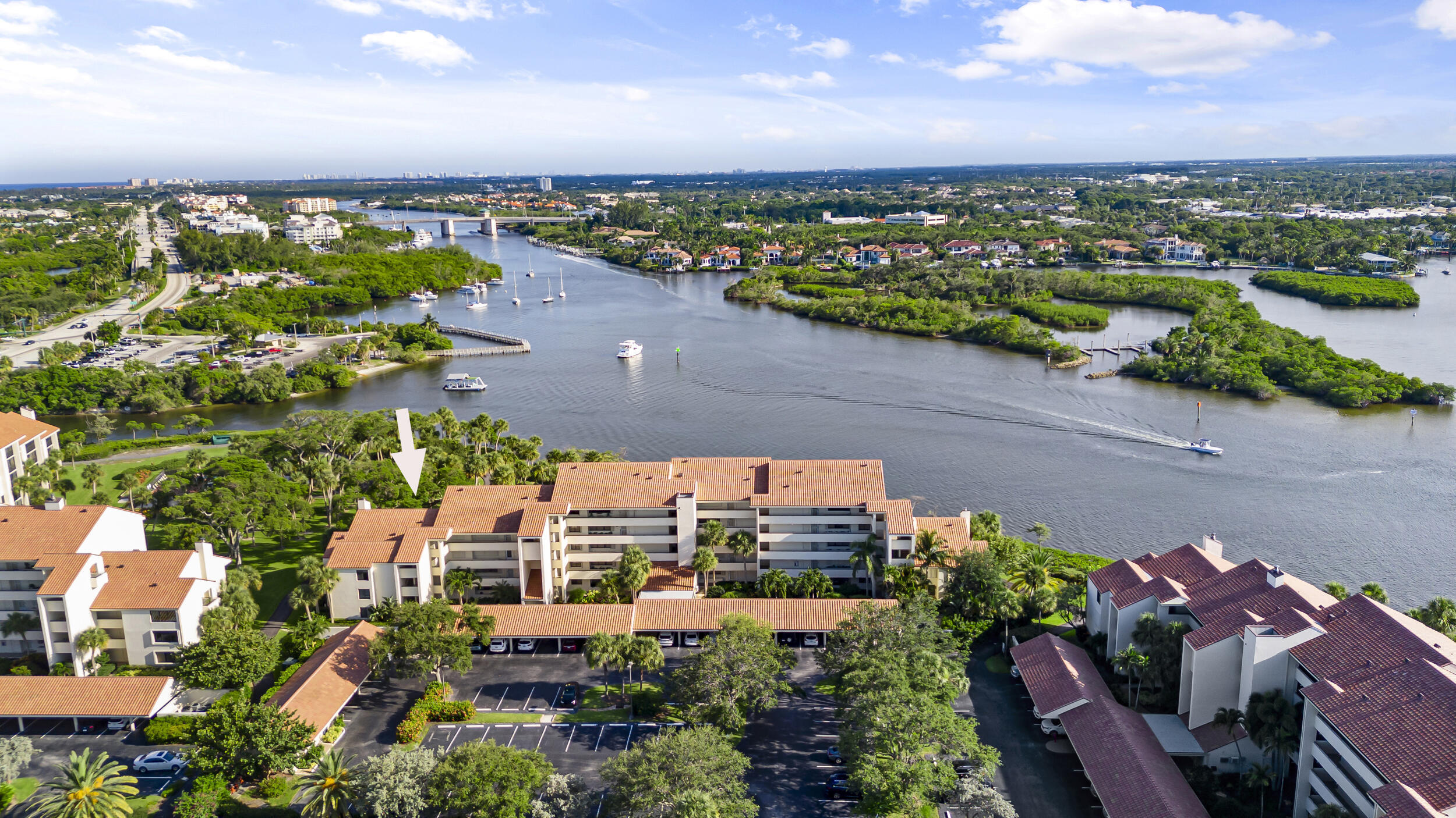 Priced to sell, this rare waterfront 3BR/2BA condo at Jupiter Harbour  is one of only two Bahama building units with over 2,000 SF and soaring vaulted cathedral ceilings, giving it a spacious single-family home feel. The interior features a flexible 3rd bedroom perfect for an office and two large balconies with gorgeous Intracoastal views. Nestled in a 24/7 guard-gated community, residents enjoy a premium marina, waterfront pool, and tennis. The location offers the ultimate Florida lifestyle: walk to upscale shopping at Harbourside Place and world-class fine dining like 1000 North. Plus, you are just minutes from Jupiter's pristine beaches and championship golf courses. Don't miss this extraordinary luxury opportunity!