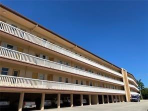 Spectacular two bedroom apartment with large master suite and walk-in closet. Amazingly Active 55+ Community. Within walking distance to all shopping and entertainment! Fully enclosed balcony overlooks the garden & pool. Washer and Dryer is outside the unit. Huge storage facility within the complex and covered parking makes this a Special Place! Features a Clubhouse with heated Community pool. Security cameras throughout complex. Pick this one and make it yours! Seller motivated!! Bring all offers!