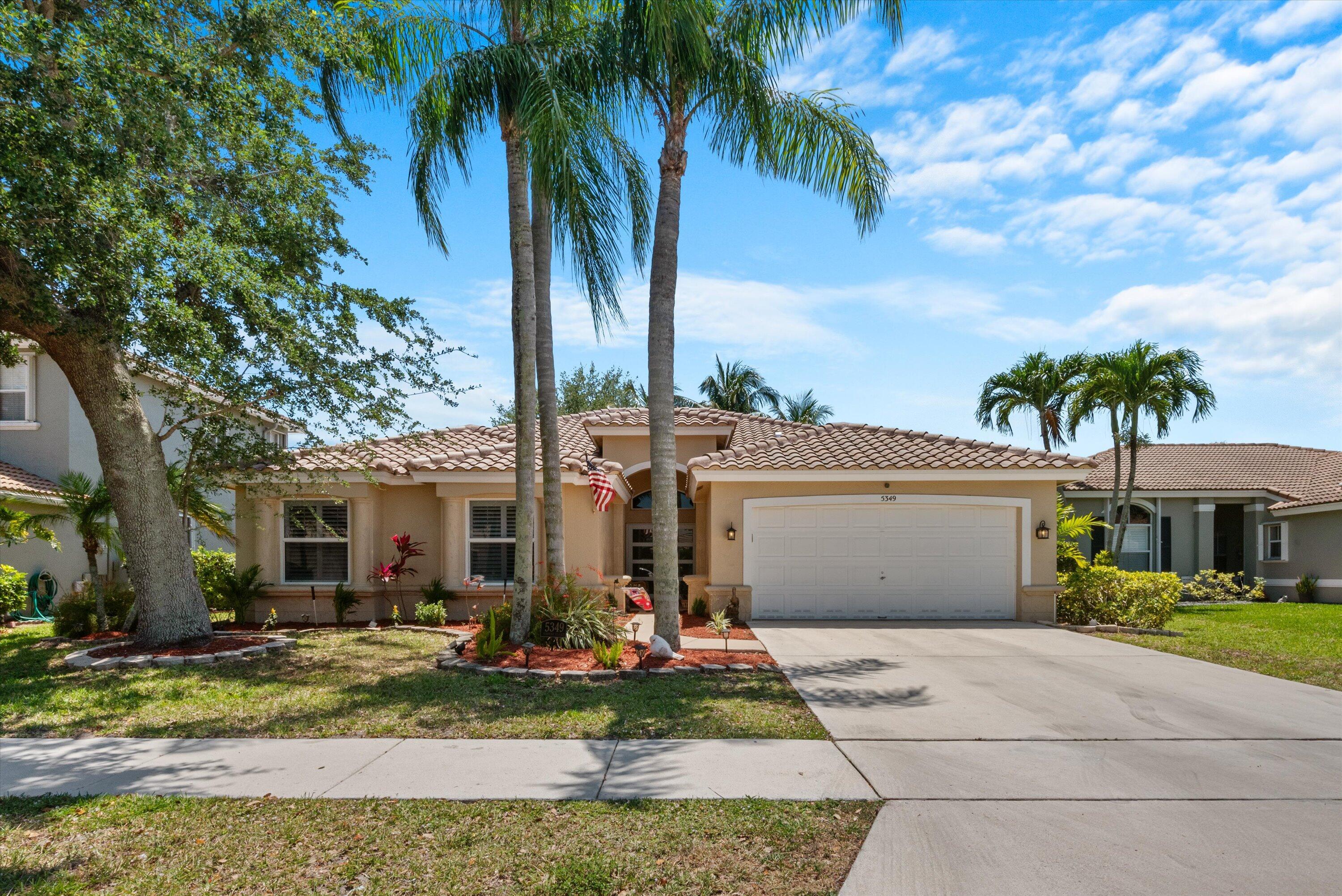 BETTER THAN NEW! Beautifully upgraded 4BR/2.5BA home in Oakmont Village at Winston Trails, one of the most desirable communities in Lake Worth, FL. Move-in ready with a new roof, new A/C, and full impact windows and doors for peace of mind and energy efficiency. The gourmet kitchen features double wall ovens, custom white cabinetry, granite countertops, and stainless-steel appliances. Luxurious designer bathrooms showcase high-end finishes and exceptional craftsmanship. Enjoy a country club lifestyle with golf, amenities, and beautifully maintained surroundings—without mandatory membership fees. Conveniently located near top-rated schools, shopping, dining, Wellington, Boynton Beach, major highways, and Palm Beach County beaches. A rare opportunity!