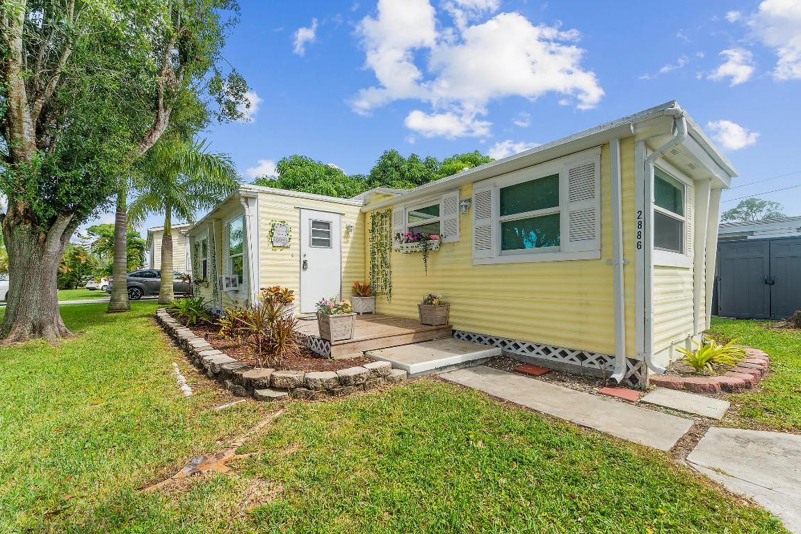 Welcome to the Beanstalk House! A beautifully updated mobile home situated on an oversized 75x100 lot with no HOA and no lot fees. This move-in-ready gem offers comfort, space, and freedom in a peaceful, private setting. Property Highlights: You own the land - no rental or park fees! Freshly painted interior with new flooring throughout, Brand-new appliances included, Roof resealed in 2024 for peace of mind, Enclosed Florida room - perfect for relaxing or entertaining, Updated lighting fixtures throughout, Well and septic system with covered pump house, Large working shed on property for storage or hobbies and Propane/gas utilities for efficient energy use. Enjoy the freedom of rural-style living with all the modern updates already done for you. Whether you're downsizing, investing, or looking for a cozy primary residence, the Beanstalk House offers charm, privacy, and value.
