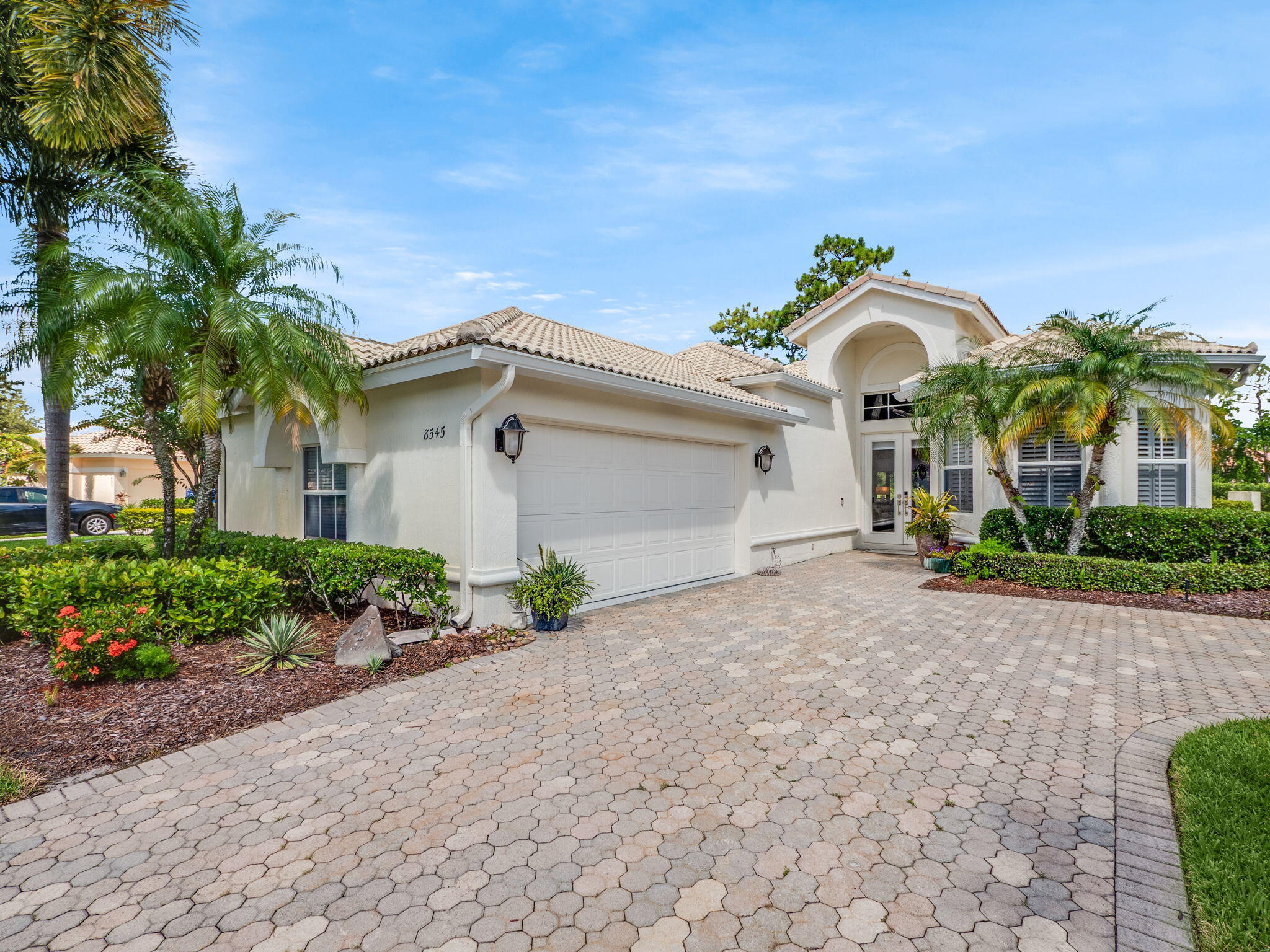 Fabulously Remodeled Furnished Pool Home. Found in the Oakhill subdivision of PGA Village, this Mid-Ocean model received a complete make-over in 2025. 2BD/2.5BA Plus Den has exquisite new engineered wood plank flooring, high baseboards, crown molding, tray ceilings and Plantation Shutters. Kitchen well equipped with new premium appliances, quartz counter tops & backsplash, 42" cabinets, large pullout drawers and Island Dining. Master has generous closets, and a bath complete with dual sinks, soaking tub, & separate shower. There is a Dining Room that can easily handle any large party and an elegant Great Room. Covered porch area & large lanai w/picture frame screen. Unobstructed views of lake and golf course, Redone and Ready. A Dream Home!