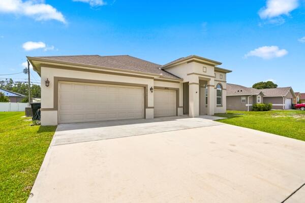 10,000 toward closing!!!  Welcome to this spacious single-story residence in Port St. Lucie, offering 2,361 square feet of thoughtfully designed living space for comfort and functionality. This five-bedroom, three-bathroom home provides ample room for guests, a home office, or flexible spaces to fit your lifestyle.  The three-car garage offers plenty of parking and storage for vehicles, tools, and recreational equipment. As an added bonus, the seller is offering $10,000 toward the buyer's closing costs, making this an incredible opportunity to reduce your out-of-pocket expenses.  Situated in an established Port St. Lucie community, this well-appointed home combines generous living space with exceptional value. Don't miss your chance to make this beautiful property your next home!