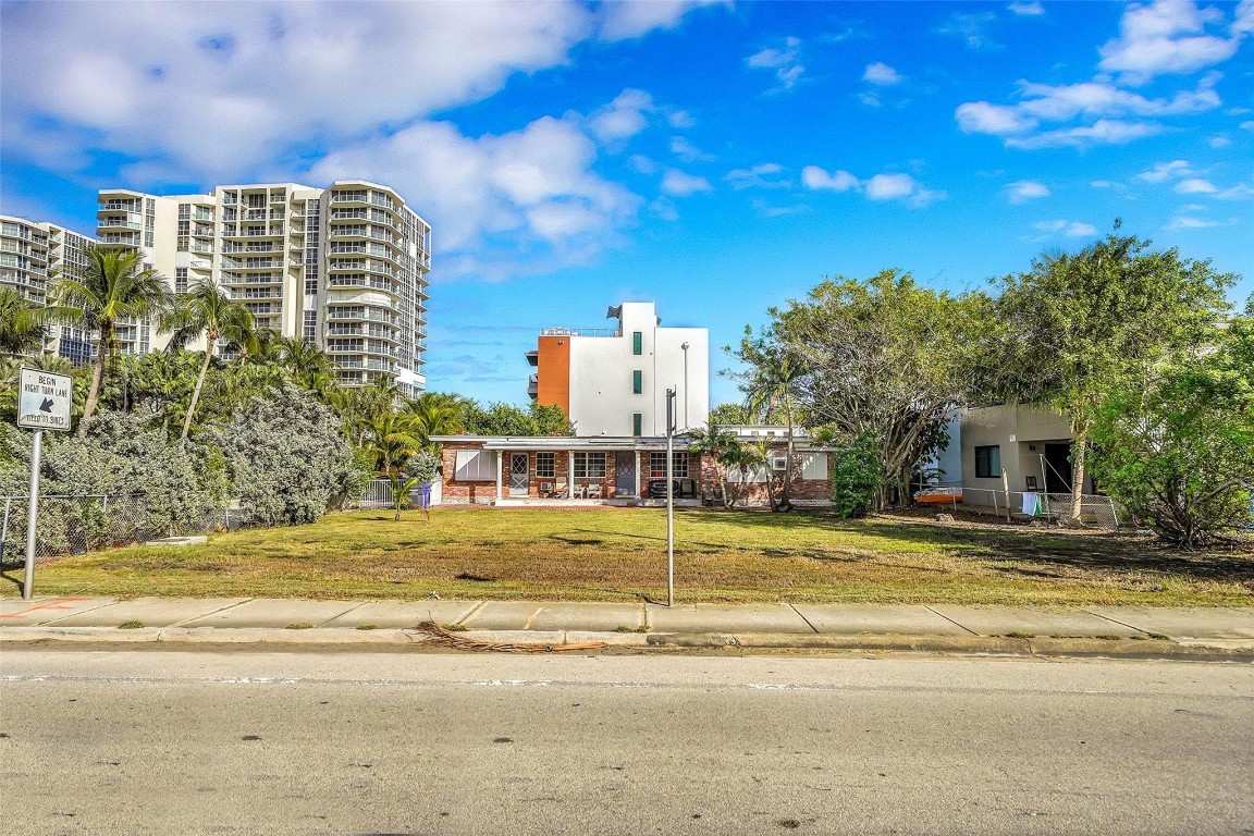 Great opportunity for investors and developers in the North Beach area of Hollywood.   This corner lot property is 3 lots put together under one owner.  (8,941 square feet) . Potential to keept ogether or subdivide.  Just yards away from the Ocean and the Intracoastal and ready for development.  Currently holds a 1,508 square foot duplex built in 1953 and rented on a month to month basis.  The property is zoned for residential/multifamily so build a luxury dream home or multi family to rent or sell.City told owner it is approved for 4 units, possibly 6 but up to Buyer to verify.
