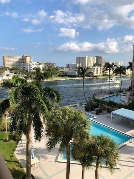 Direct waterfront South side condo 2/2 split plan with wonderful Intracoastal and pool views.  Garage  parking, 24 hour manned on site security guards.  Pet friendly- & ok for 2 pets up to 25 lbs each. Main bedroom w/two walk in closets, separate tub/shower room w/sink & large dressing room area with additional sink & tons of storage.  Guest bedroom suite is located on the opposite side of the condo with it's own bath w/walk in shower and  a full size washer/dryer. Large kitchen pantry and add'l linen closet for more storage. Spacious Balcony perfect for entertaining & watching mega yachts sail by. Just a short block over the Intracoastal bridge to Pompano's awesome beach, Tiki bar & restaurants & 1 mile to fishing pier.  Approx. 1 mile to Pompano Municipal Golf Course and Sports Complex.