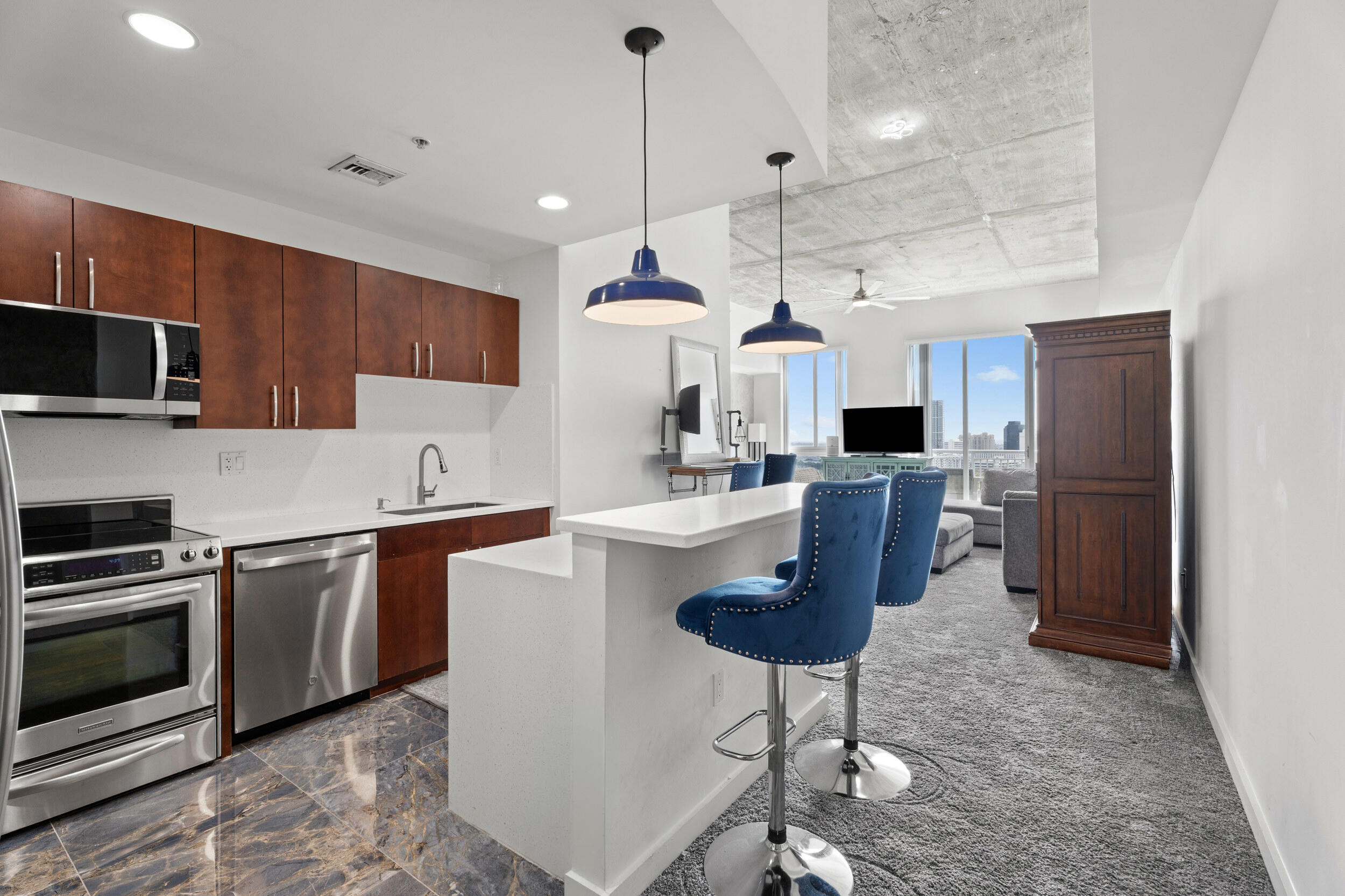 RARELY available TURNKEY PENTHOUSE GEM! 1BED/1BA Water Views of Ocean * Intracoastal!! Most Popular & Largest 1 Bed Floor Plan at the Highly Desired Edge Condo. Spacious & Beautifully FURNISHED. INVESTORS DREAM or your dream home! Private Balcony. 12ft ceilings. Stylish Exposed Concrete. BRAND NEW GORGEOUS FULLY GUT RENOVATED throughout. W/D in unit. Rent right away, up to 12x per year. Brand New Construction next door and major plans for ''Transit Village'', centered around The Edge. Fully funded reserves, no pending or special assessments. Recently remodeled circular driveway, fitness center, repainting/maintenance of entire building exterior complete. 24 hr concierge, resort style pool deck. Pets welcome. 1 parking space. Currently tenant occupied - may renewal or cancel early.