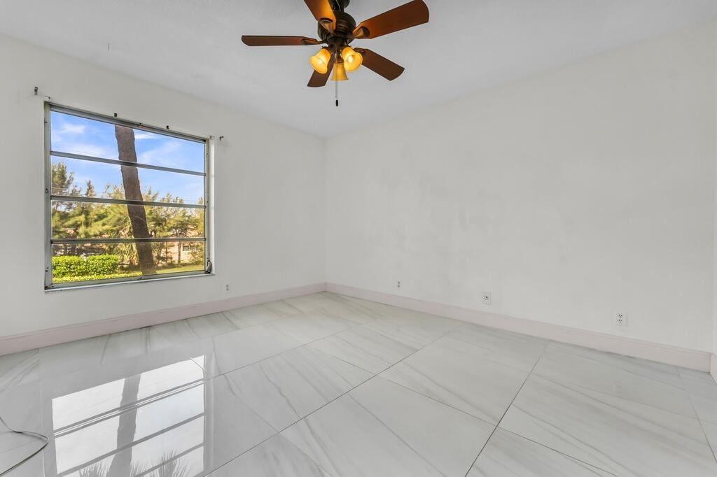 Beautifully maintained and move-in ready, this 2-bedroom, 2-bathroom condo offers the perfect blend of comfort, style, and convenience in the heart of East Boca Raton. Freshly painted throughout, the bright and inviting interior features polished ceramic tile flooring and a thoughtfully designed layout, while one bathroom has been tastefully renovated with modern finishes. Relax on the private screened balcony, the perfect spot for morning coffee or evening unwinding. Ideally located just minutes from Florida Atlantic University, Boca Raton's pristine beaches, Mizner Park, premier shopping, dining, and major highways, this home offers an exceptional lifestyle. Residents enjoy a secure building with elevator access, bicycle. The AC was replaced in 2023 AC and water heater in 2024.