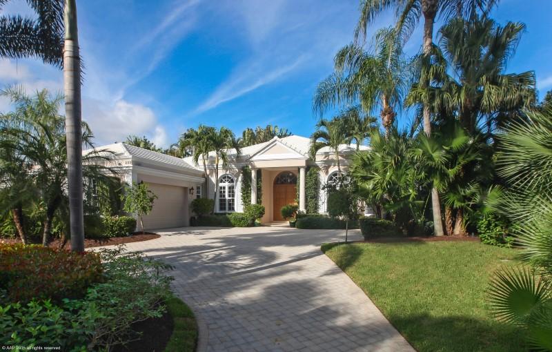 Casual elegance grace this 3 bedroom plus den, 4.5 bath residence ideally located a mile north of Royal Poinciana  Way. Open floor plan is perfect for entertaining. High ceilings throughout. Split bedrooms configuration includes large master suite with two full bathrooms and generous closet space. Cozy family room overlooking pool. New hurricane impact resistant windows and doors. Roof is approximately  two years old. Secluded and nicely landscaped pool area. High elevation and much more! 4,366 total square feet. Custom built in 1997 for only occupant. First time on market!