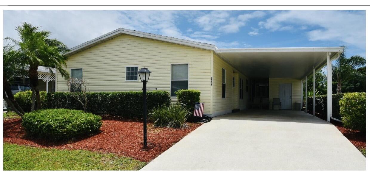 Large double wide manufactured home in Savanna Club, on a beautiful corner lot in "The Preserve " section, with 2 bedrooms and an additional den which can be used as an office or 3rd bedroom. Laminate flooring in main living area with tile in the kitchen and bathrooms. Carpet in bedrooms. I Amenities include 3 swimming pools, golf, clubhouse, gym and cafe. Active 55+ community. This is a Land Lease property. HOME is being Sold as-is.