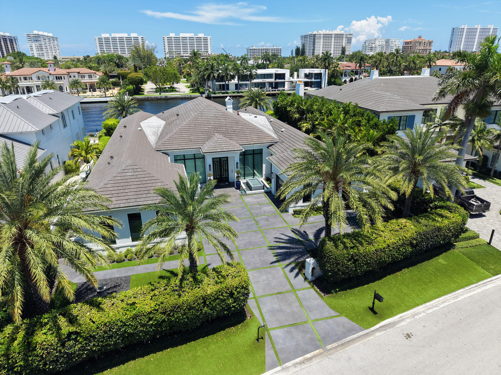 A rare single-story Intracoastal estate in Royal Palm Yacht & Country Club built in 2022.