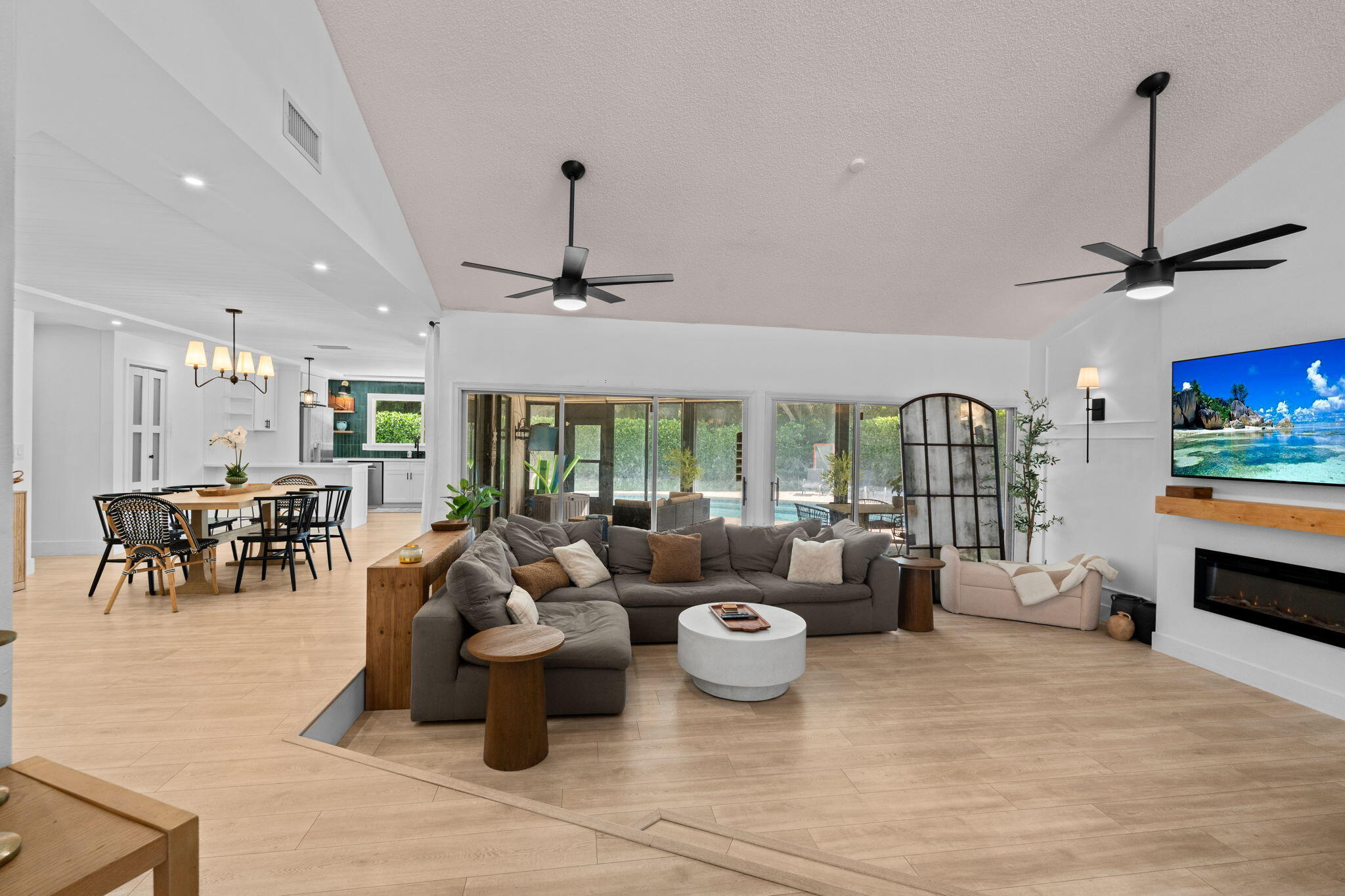 Experience refined living in Marlwood Estates at PGA National with this beautifully renovated, fully furnished pool home offering a seamless blend of style, comfort, and privacy. Situated on an oversized lot within one of Palm Beach Gardens' most sought-after gated communities, this exceptional residence has undergone an extensive renovation within the past year, including a stunning new kitchen, fully updated bathrooms, a redesigned fireplace, and fresh interior and exterior paint throughout.  Light-filled living spaces create an inviting atmosphere ideal for both everyday living and entertaining. The thoughtfully designed kitchen features contemporary finishes and ample storage, while the spacious primary suite offers a spa-inspired bath and tranquil views of the private backyard.  Additional bedrooms provide comfortable accommodations guests.  Step outside to your own tropical retreat, complete with a beautiful pool, expansive patio areas, and lush landscaping. Located within the gates of PGA National, residents are just minutes from championship golf, world-class dining, shopping, and beaches.  Available fully furnished at $6,500 per month for an annual lease or $12,500 per month for a seasonal lease. Pet-friendly and large dogs welcome.