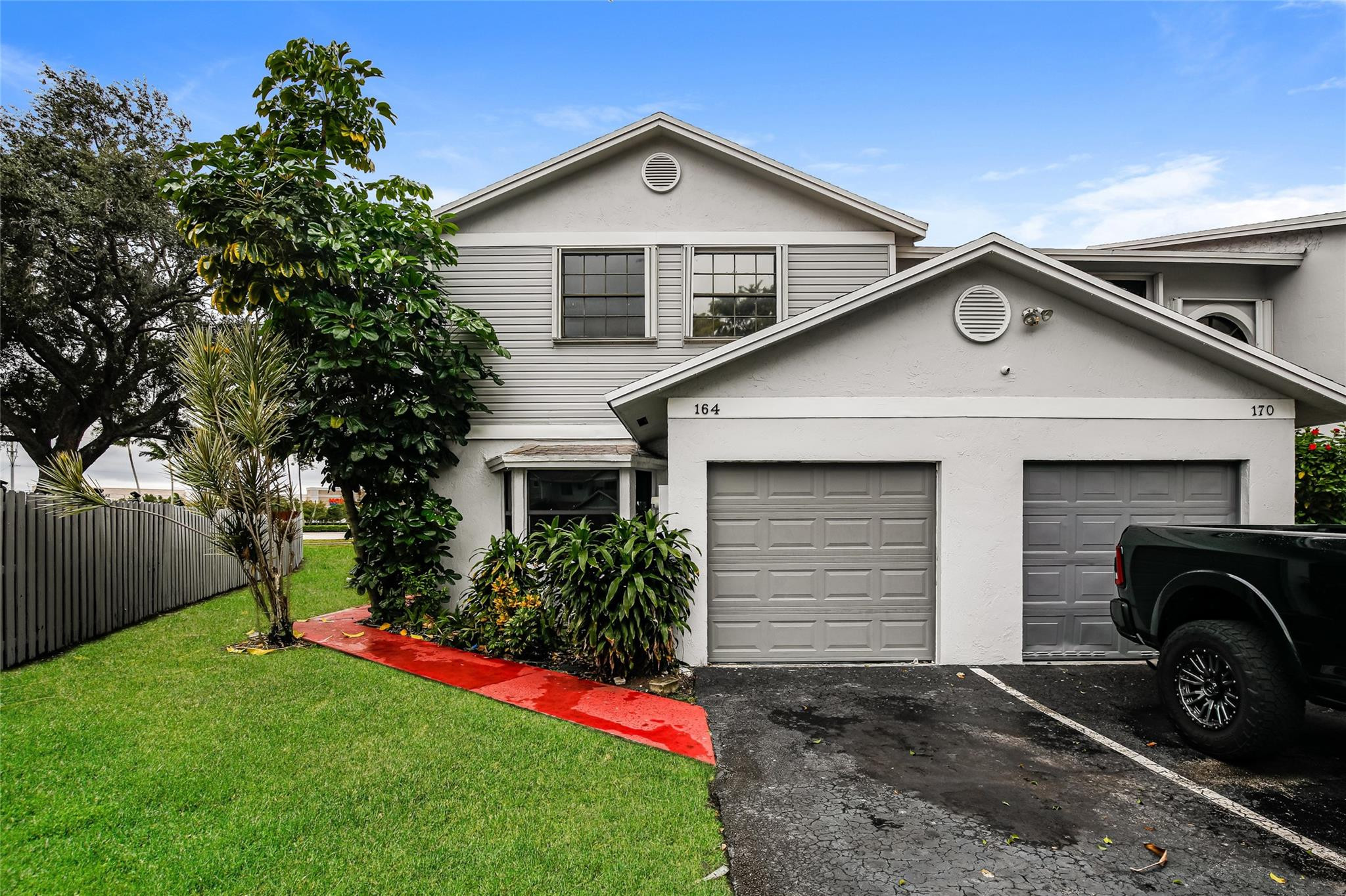 Updated 3-bedroom, 2.5-bath townhome located in desirable Pembroke Pines. This home features a spacious, open layout with modern finishes throughout, perfect for comfortable living and entertaining.The kitchen and living areas flow seamlessly, while the generously sized bedrooms provide plenty of space and privacy. The garage has been partially converted, offering flexible additional living or storage space, and can easily be converted back to a full garage if desired.Enjoy the convenience of a low-maintenance townhome lifestyle close to top-rated schools, shopping, dining, parks, and major highways. Newer Roof ( 2022) Move-in ready!