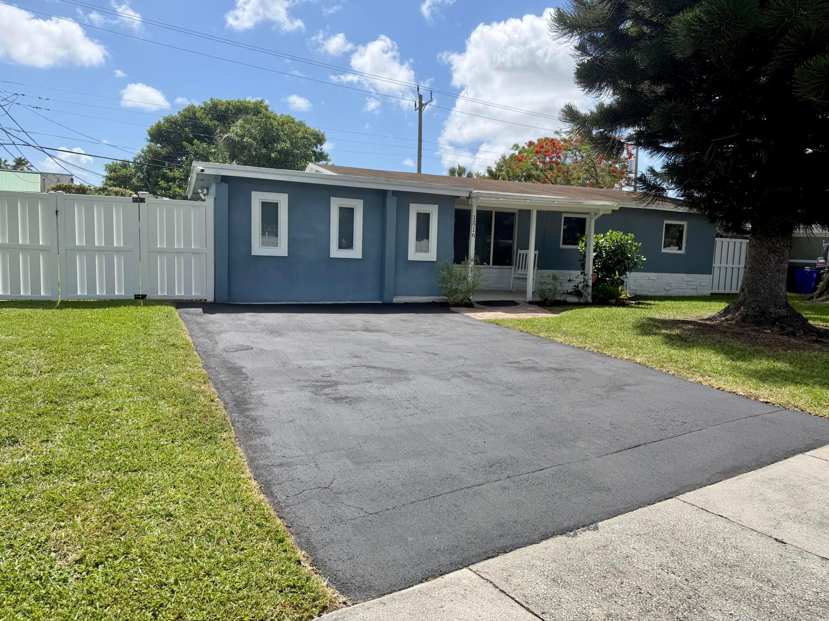 A true labor of love, ready to welcome its next owner into a space that feels like home from the moment you walk in. Beautifully maintained & move-in ready, this inviting 4-bedroom pool home blends comfort, charm, and modern upgrades. Features include full impact windows/doors for added security & insurance savings, wood-like tile in main areas, laminate in bedrooms, & updated appliances, PVC fencing, outdoor storage shed & two AC units. NO HOA! A cozy entryway with a shiplap accent wall sets the tone, leading into a stylish two-tone kitchen with a quartz waterfall countertop, perfect for everyday living and entertaining. Enjoy seamless indoor-outdoor living with a covered, screened-in lanai featuring wood-like tile, opening to a sparkling pool just beyond, ideal for relaxing or hosting.